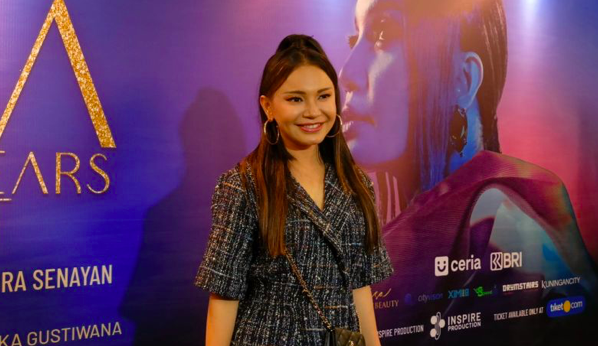 Penyanyi Rossa usai konferensi pers 