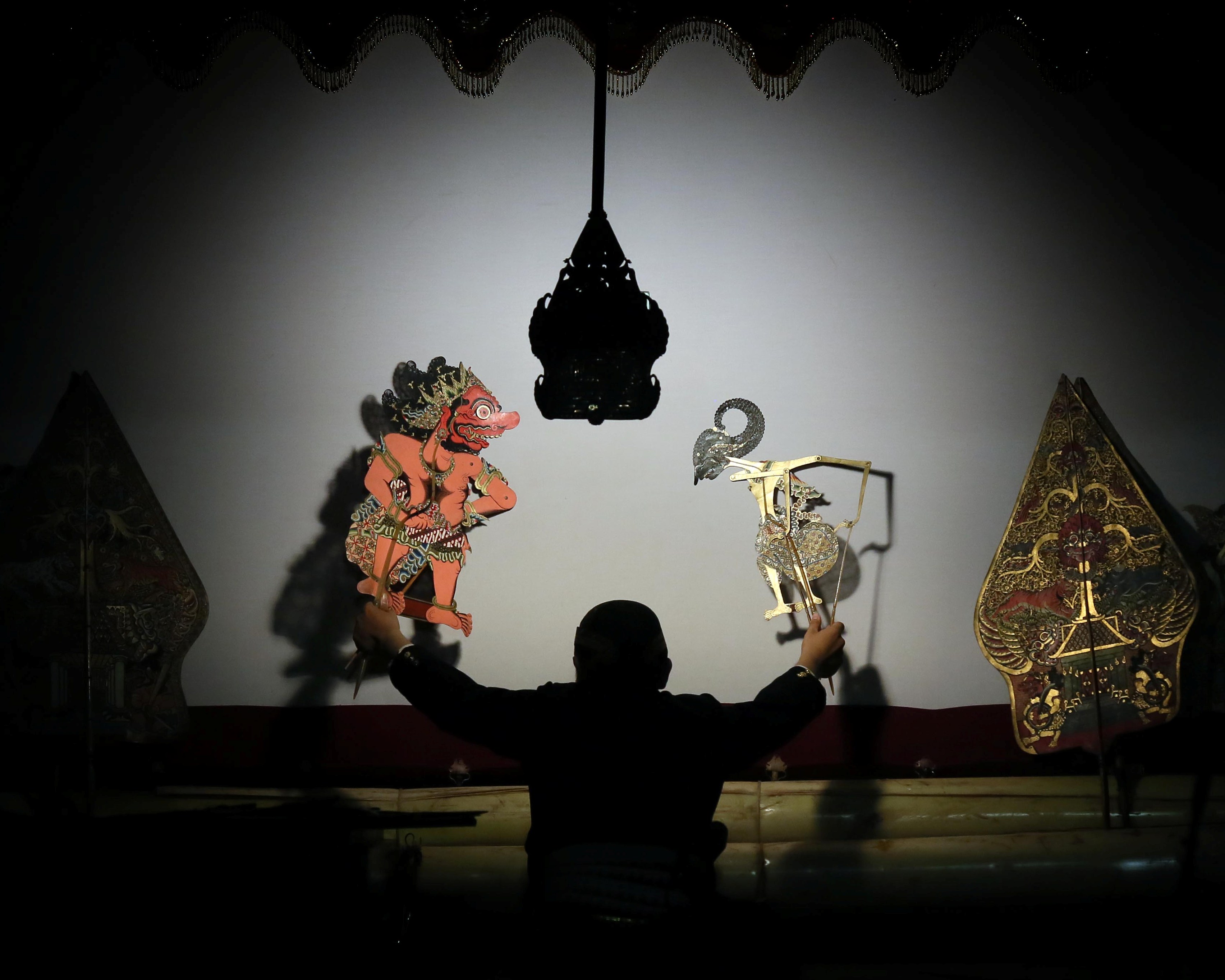 Ilustrasi pertunjukan wayang kulit