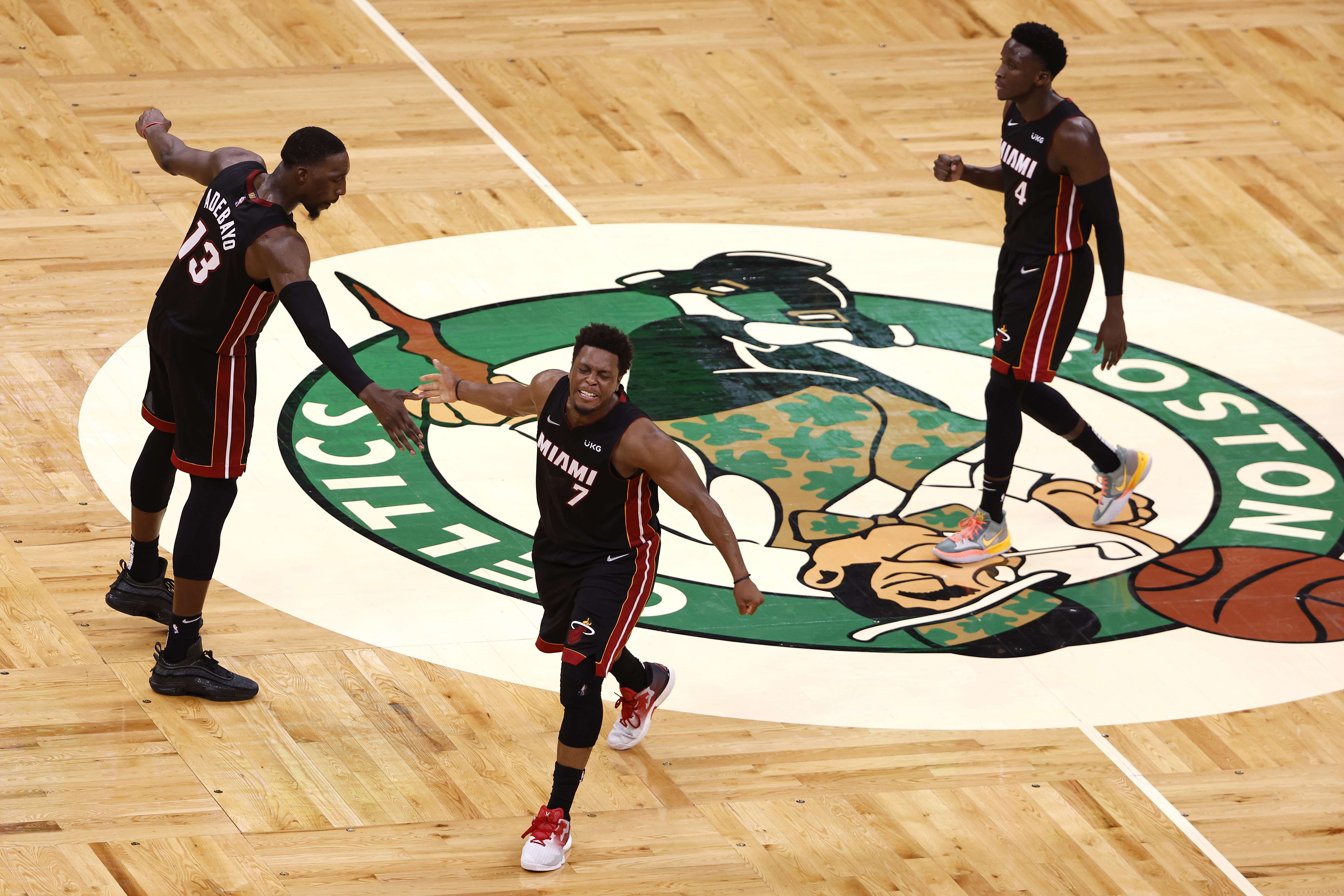 Miami Heat merayakan kemangan setelah mengalahkan Boston Celtics di laga Playoff NBA.