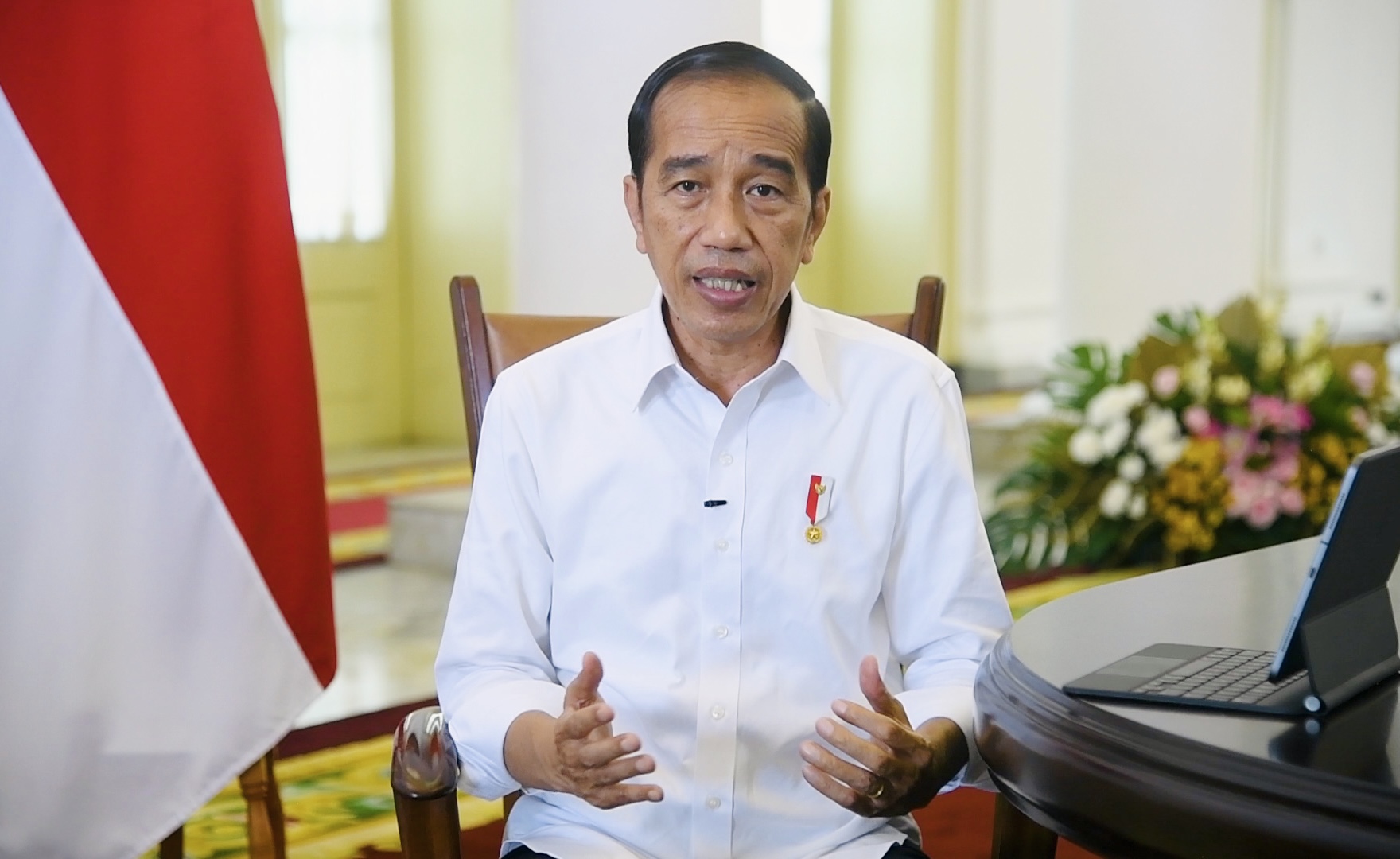 Presiden Jokowi saat menyampaikan keterangan pers.