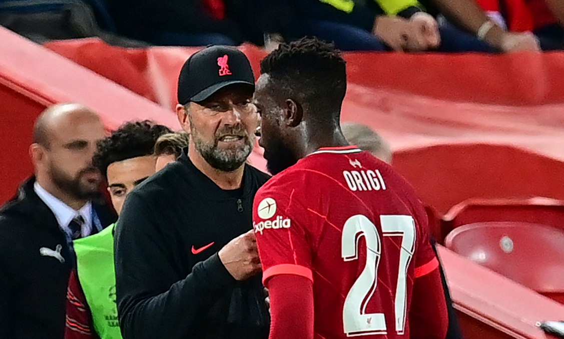 Jurgen Klopp (kiri) pastikan Divock Origi akan meninggalkan Liverpool.