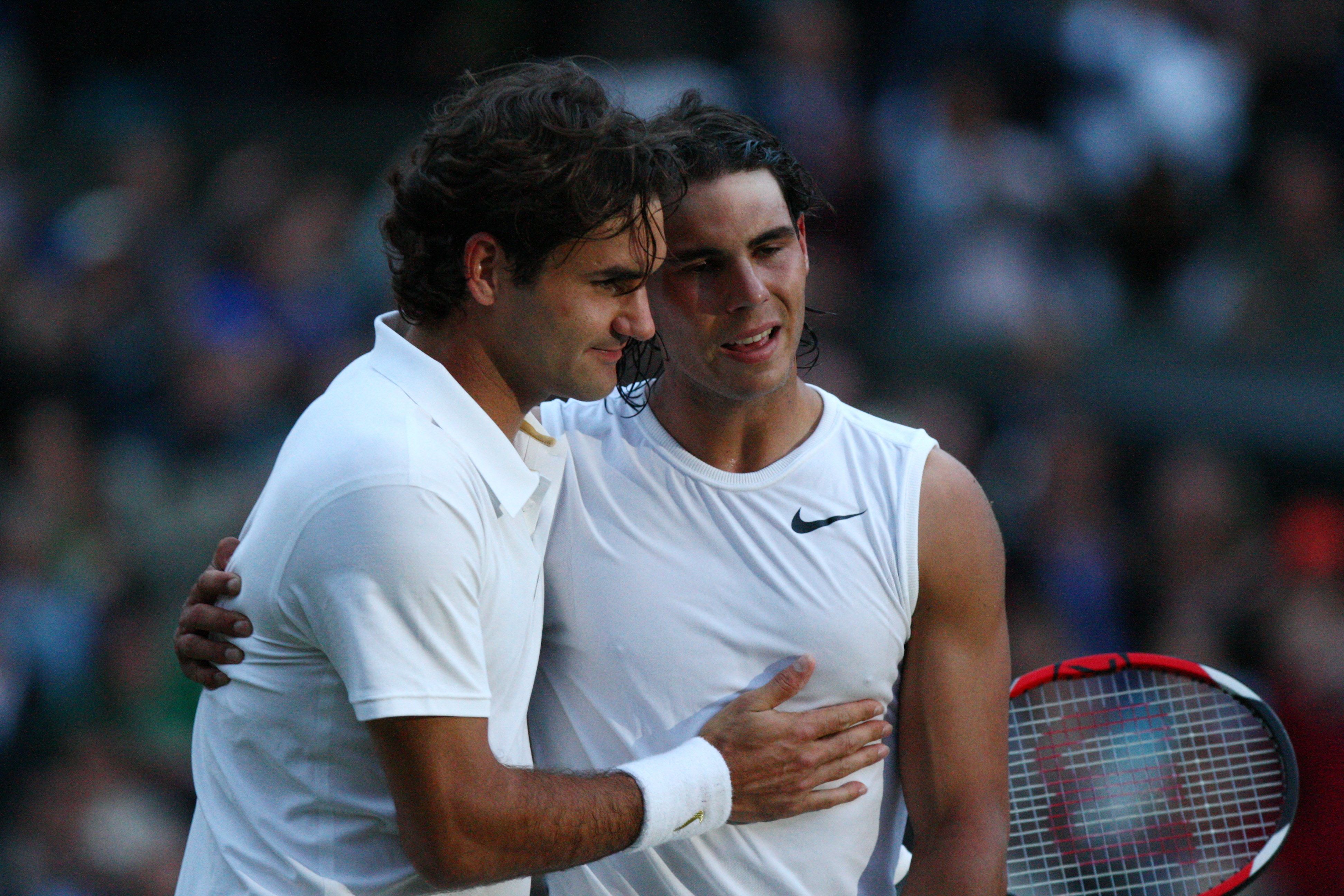 Rivalitas Rafael Nadal dan Roger Federer di grand slam lapangan rumput Wimbledon.