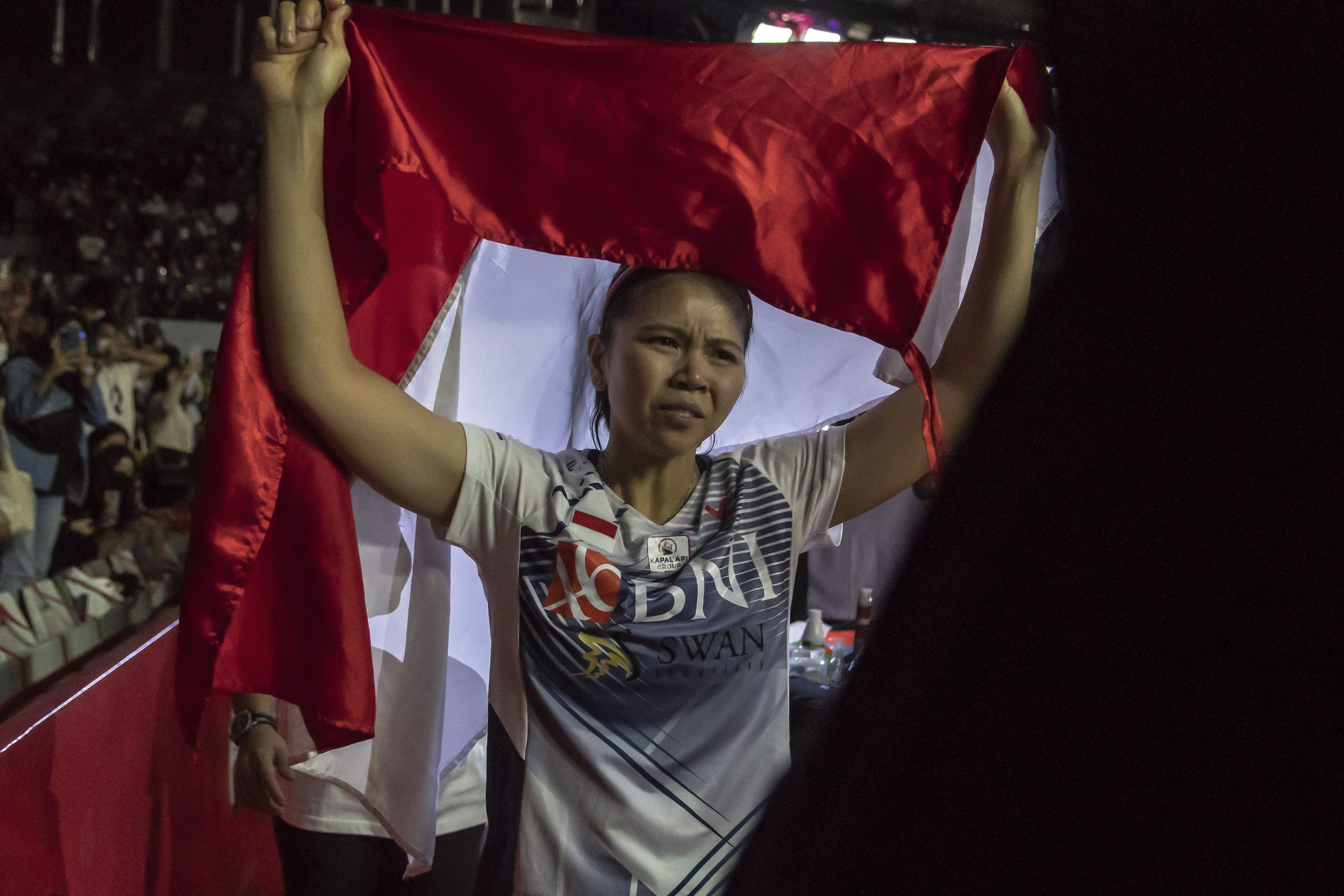 Pebulu tangkis Greysia Polii berjalan pada acara 