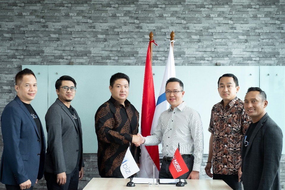 Penandatanganan kerja sama antara Mbizmarket dan Nobu Bank