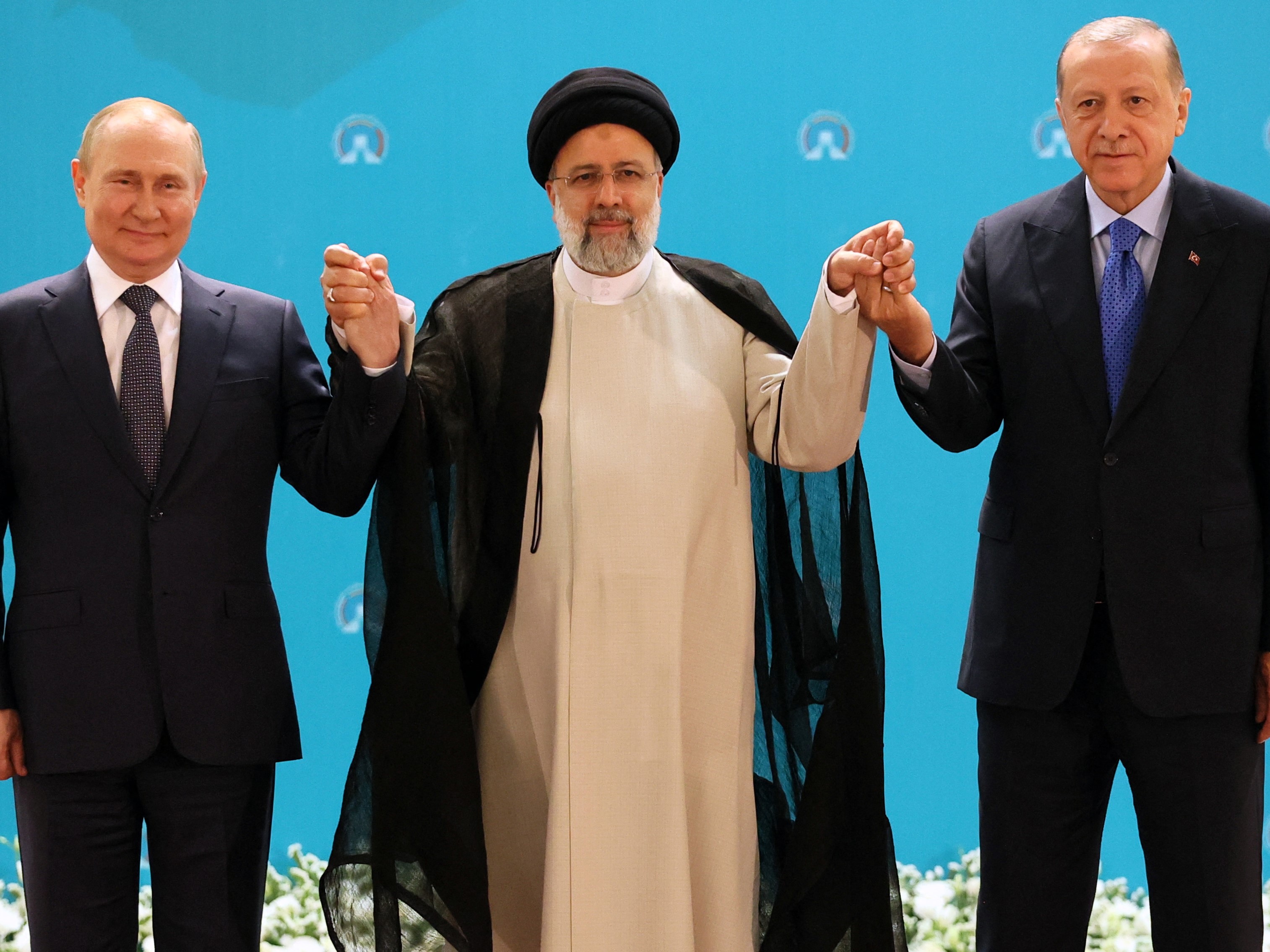 Presiden Rusia Vladimir Putin, Presiden Iran Ebrahim Raisi, dan Presiden Turki Recep Tayyip Erdogan.