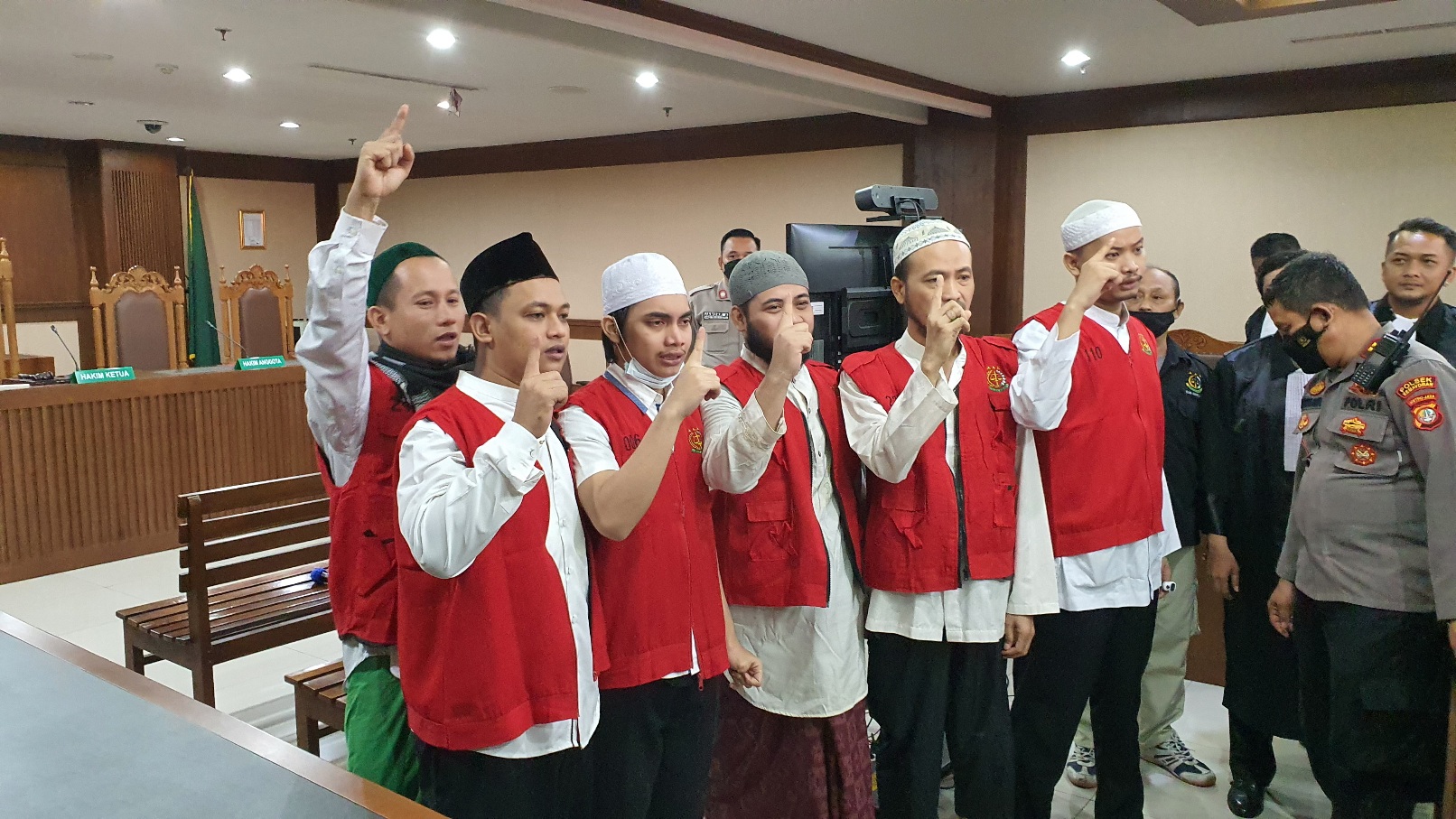 Enam terdakwa pengeroyok Ade Armando.