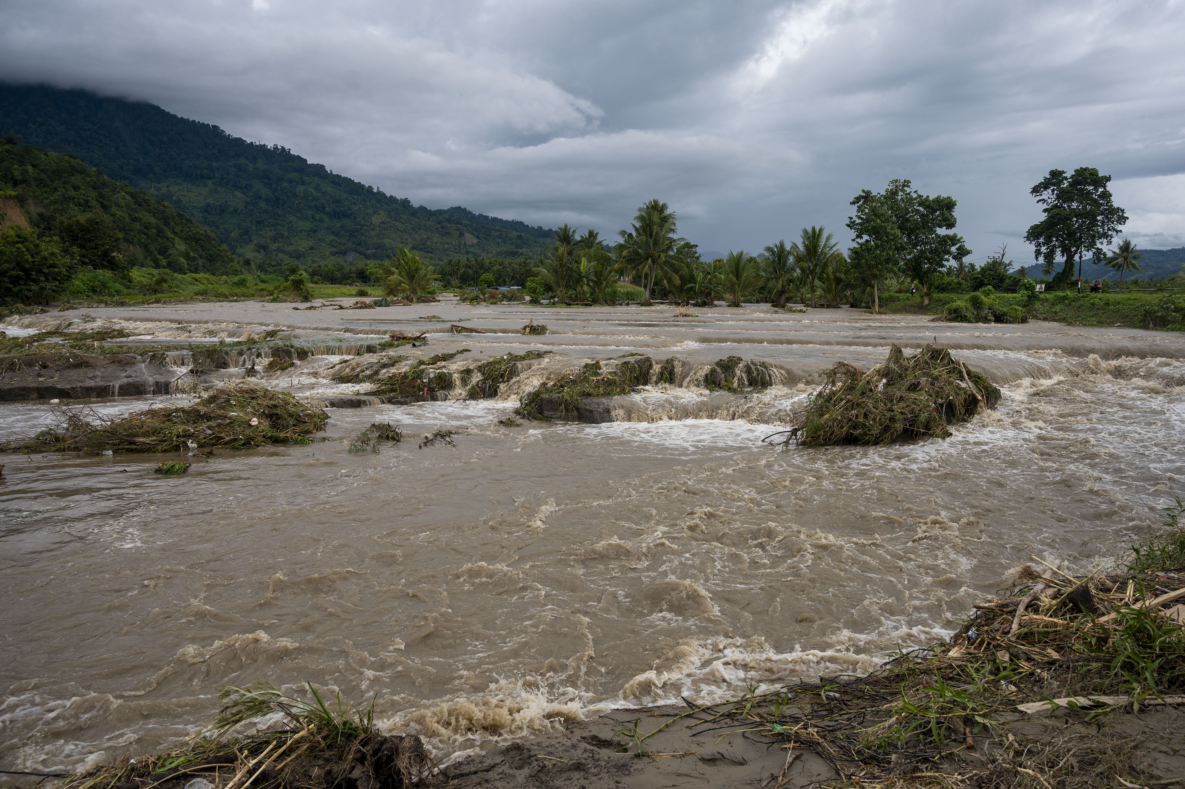 Lahan pertanian yang rusak akibat terkena banjir setelah jebolnya tanggul Sungai Gumbasa di Desa Pakuli Utara, Sigi, Sulteng, Selasa (6/9).