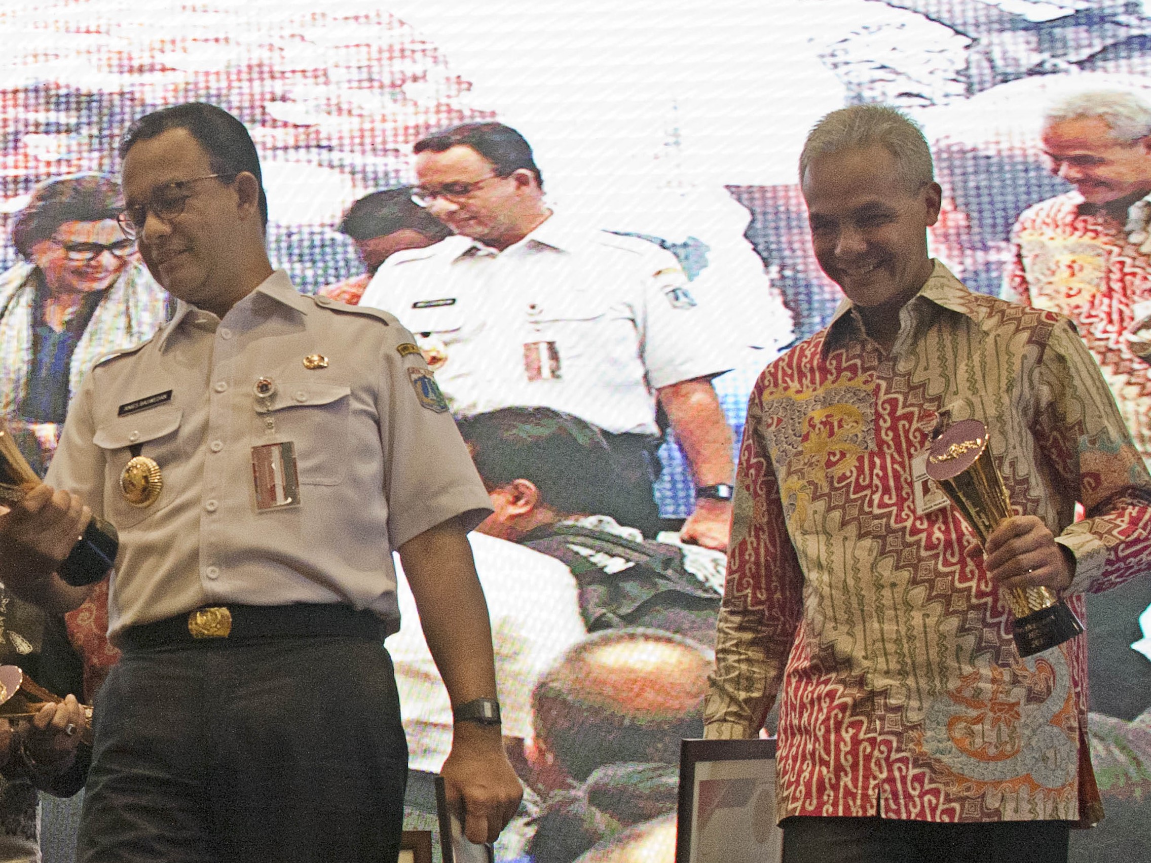 Anies Baswedan dan Ganjar Pranowo.