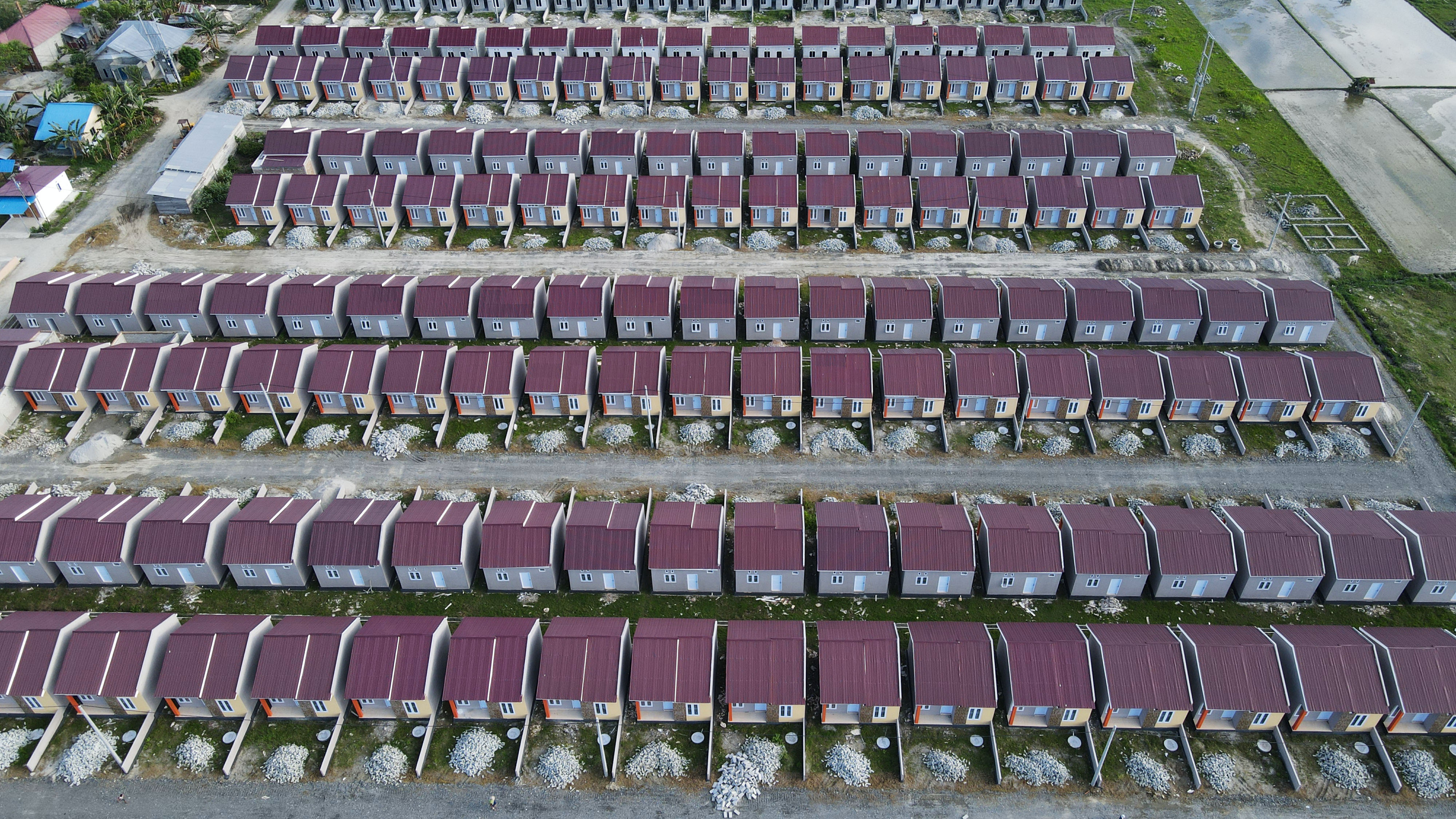 Foto udara pembangunan perumahan bersubsidi di Kabupaten Sigi, Sulawesi Tengah, Jumat (2/9/2022)