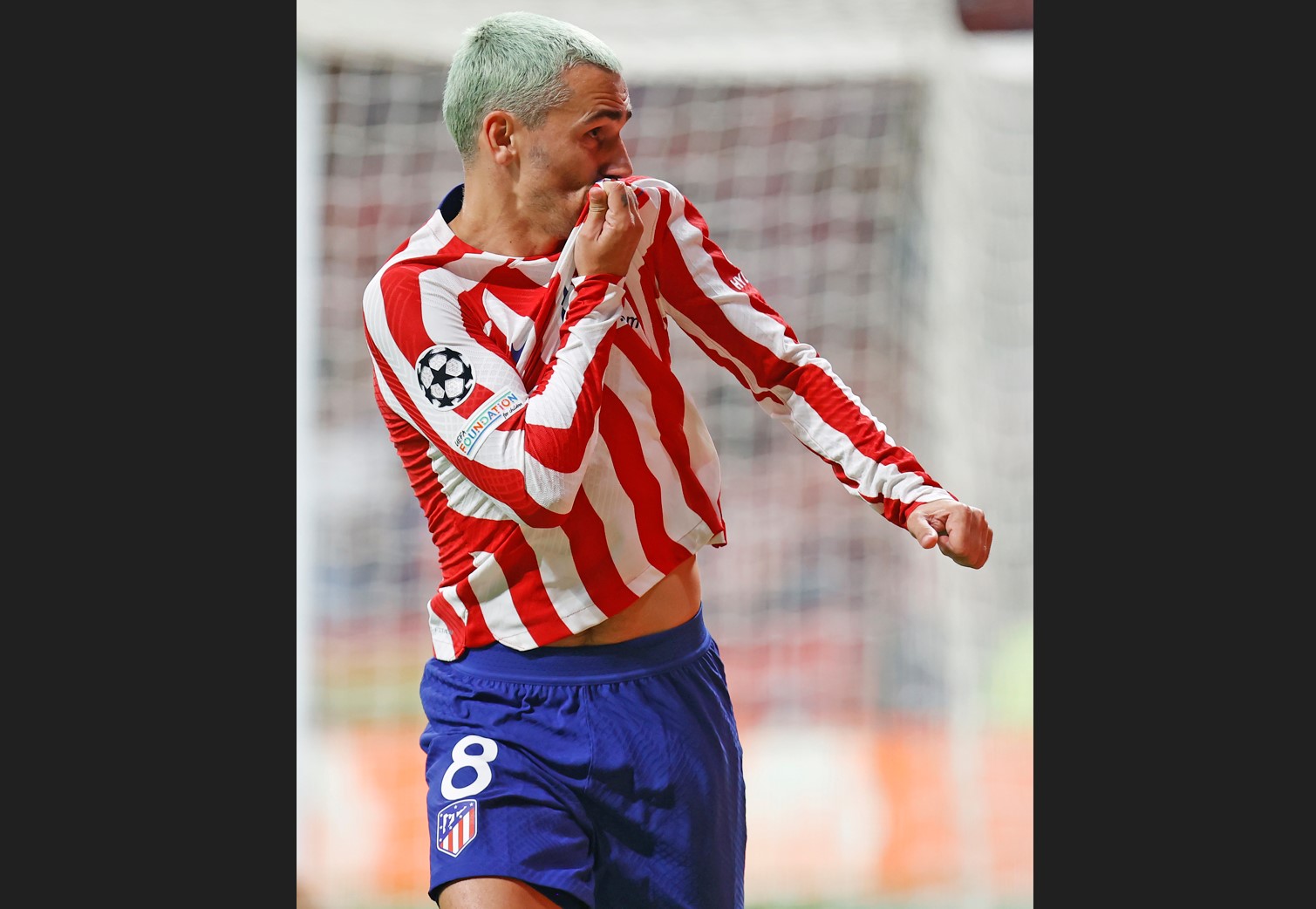 Penyerang Atletico Madrid Antoine Griezmann melakukan selebrasi usai mencetak gol ke gawang Porto di laga Liga Champions.