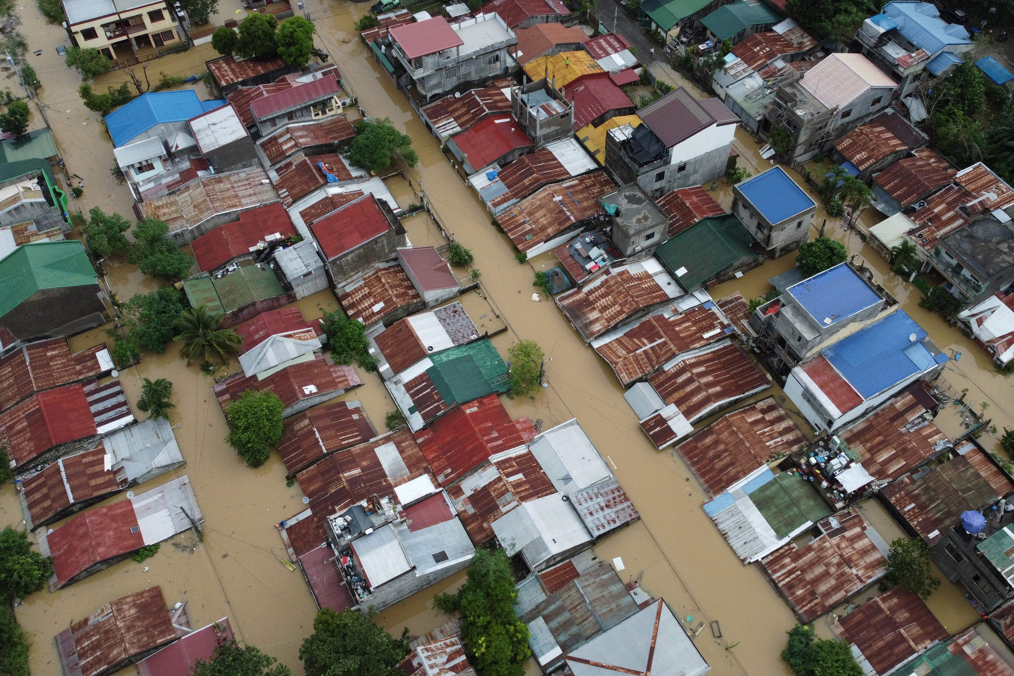 Foto Aerial banjir yang melanda sejumlah wilayah yang terendam banjir karena tinggi curah hujan.