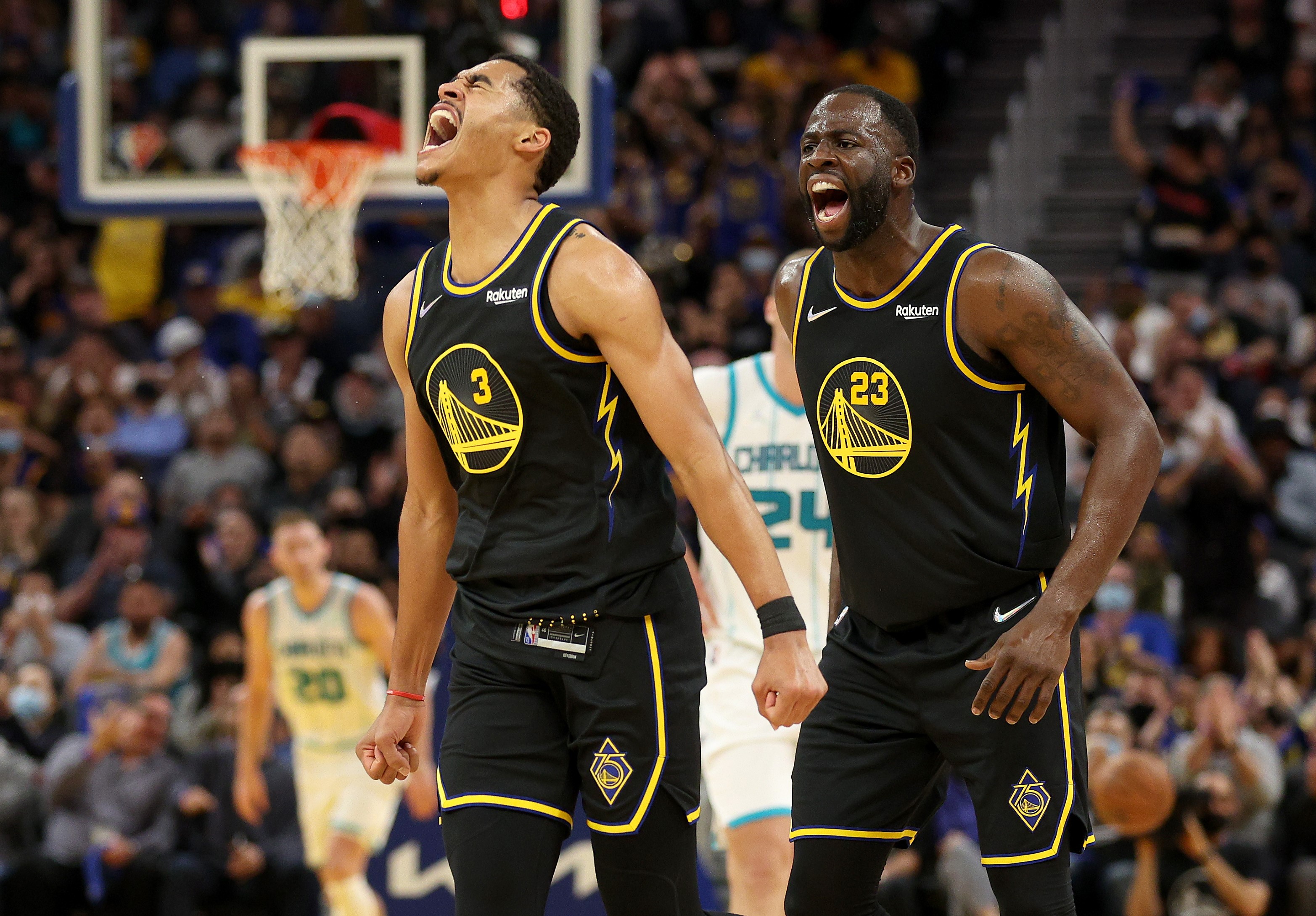 Duet pemain Golden State Warriors Jordan Poole (kiri) dan Draymond Green