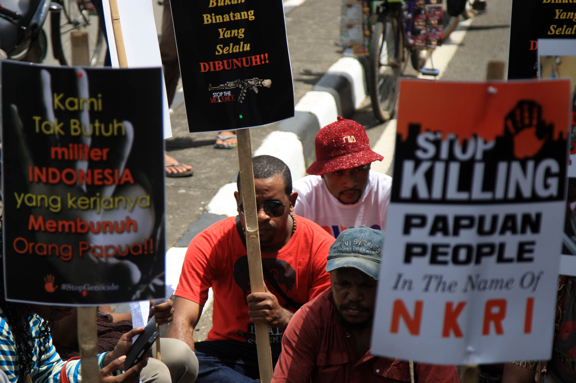 Aksi protes terhadap kasus pelanggaran HAM berat di Paniai, Papua.