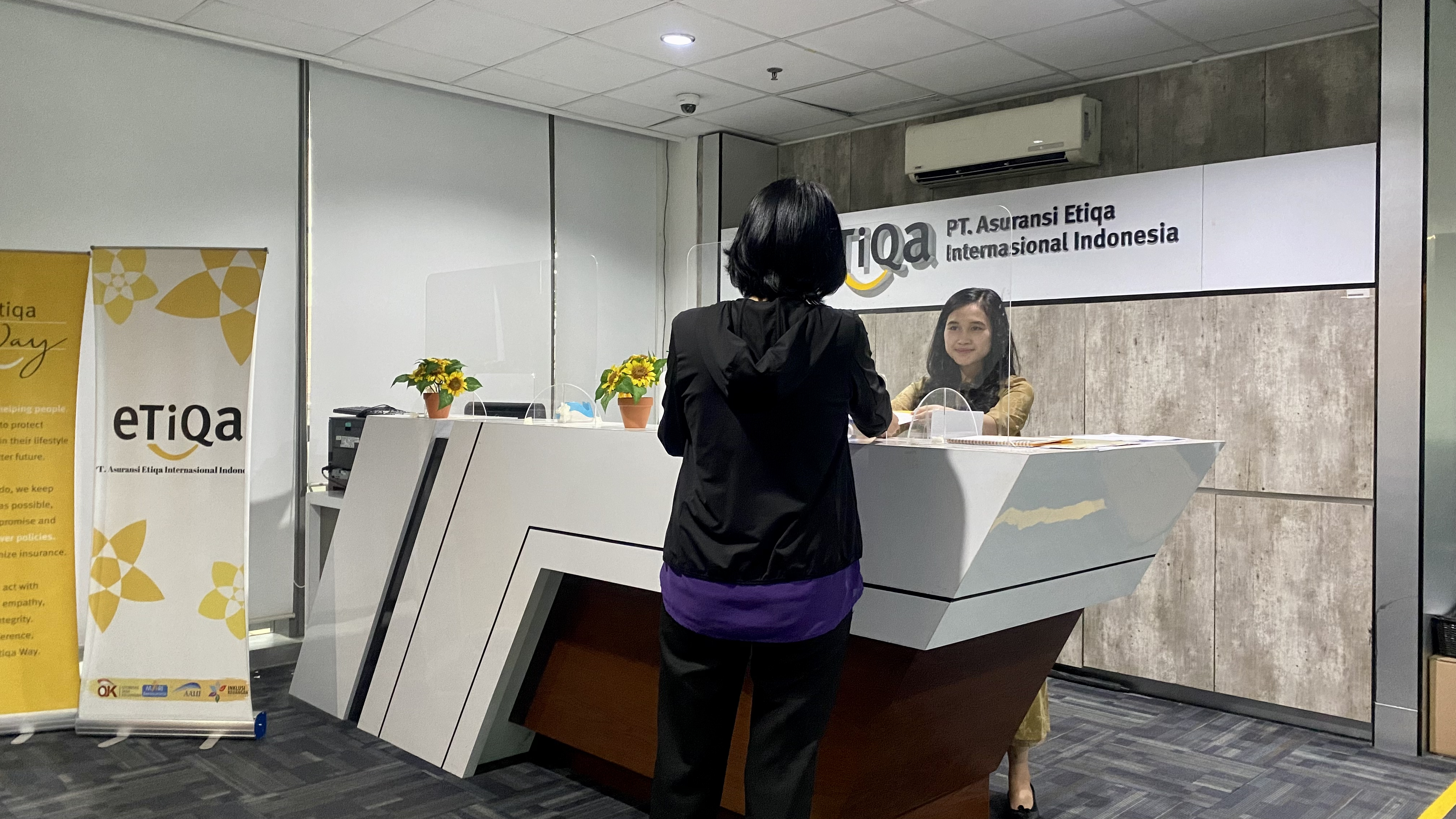 Ilustrasi layanan asuransi ETIQA