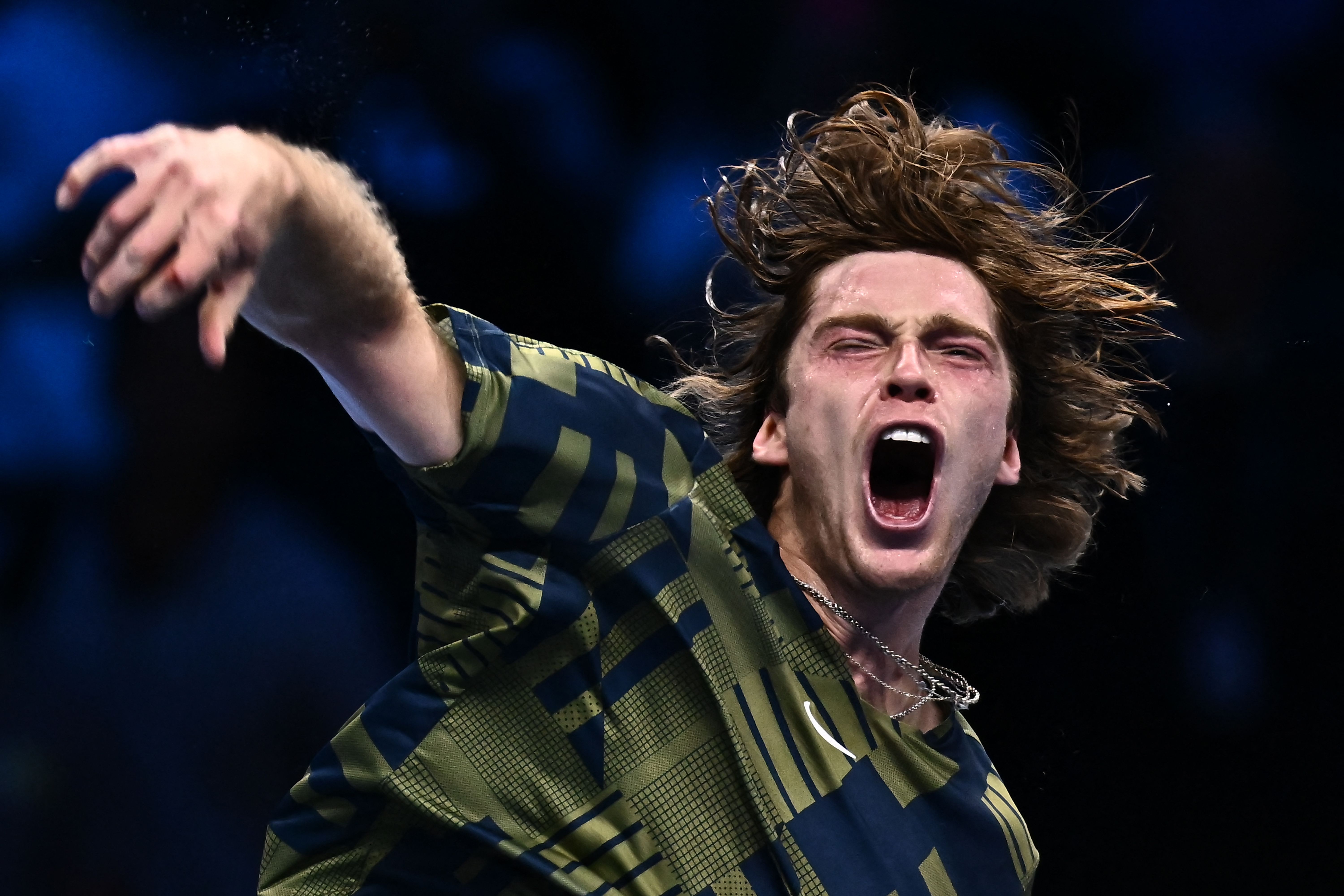 Petenis Rusia Andrey Rublev melakukan selebrasi usai mengalahkan Daniil Medvedev di ATP Finals.