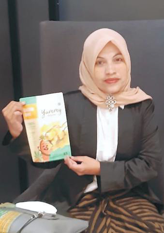 Pemilik Yammy Babeh, Ade Soelistyowati.