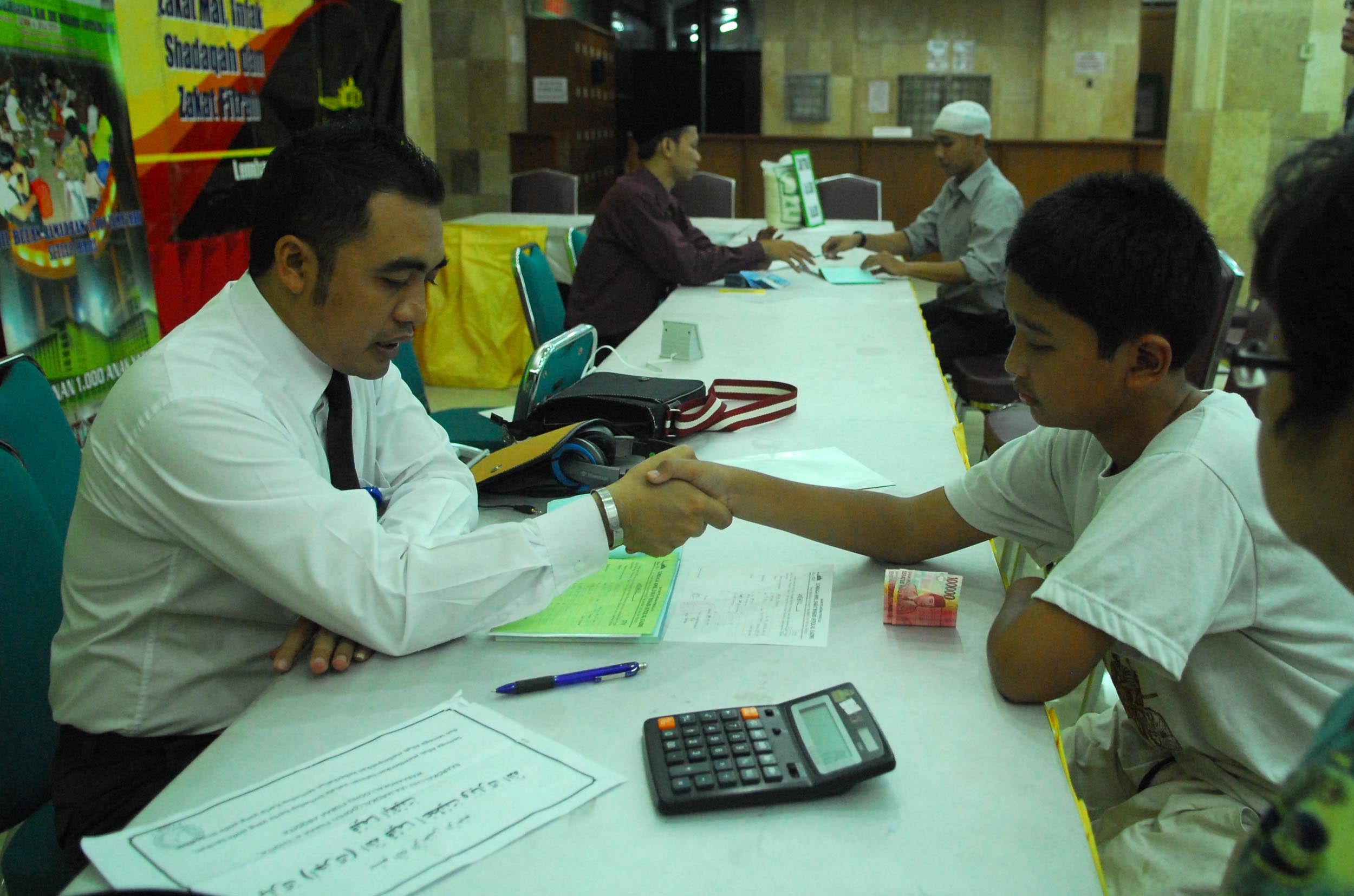 Ilustrasi pembayaran zakat