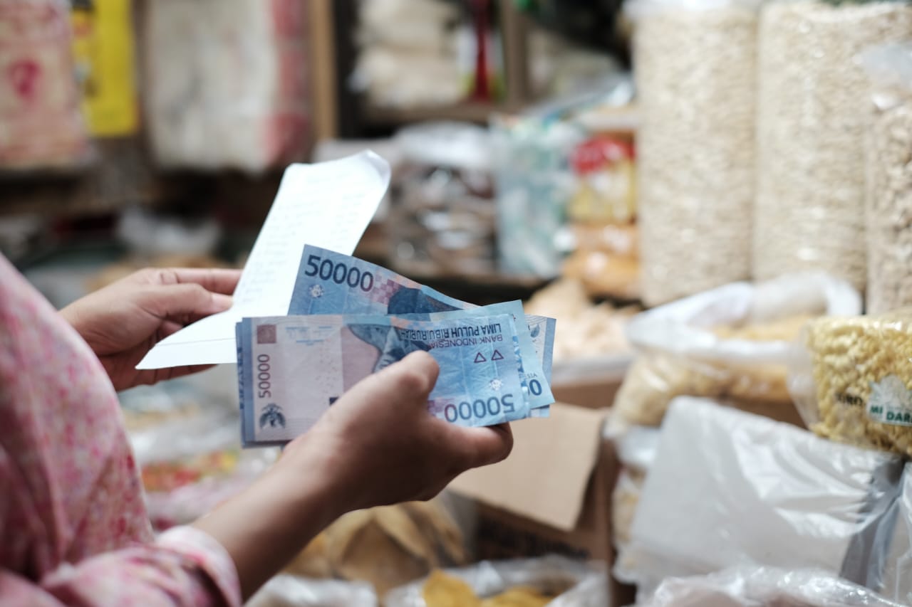 Ilustrasi perputaran uang yang mendorong pertumbuhan ekonomi