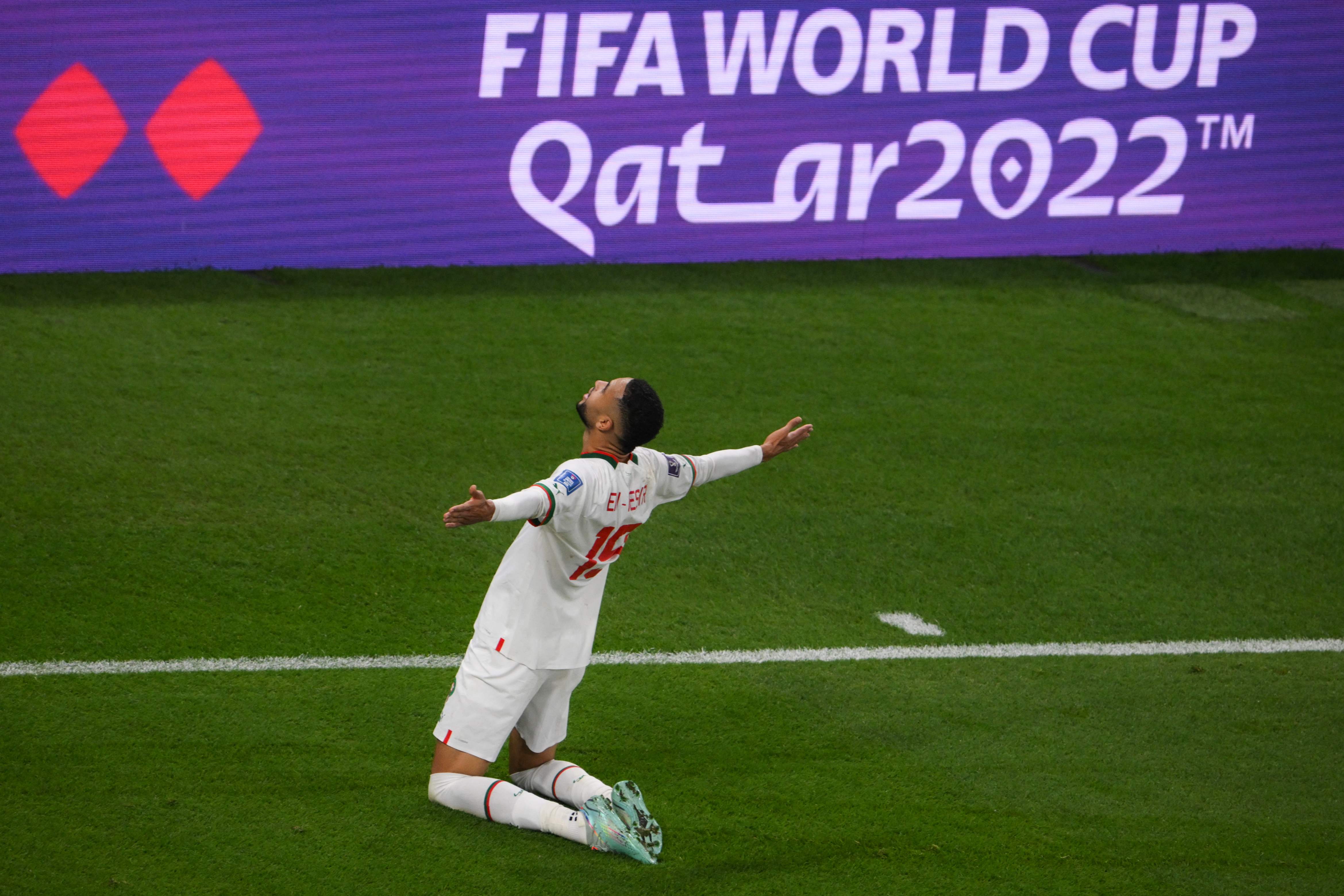 Pemain Maroko, Youssef En-Nesyri meluapkan kegembiraan usai mencetak gol ke gawang Kanada dalam laga Grup F Piala Dunia 2022 Qatar.