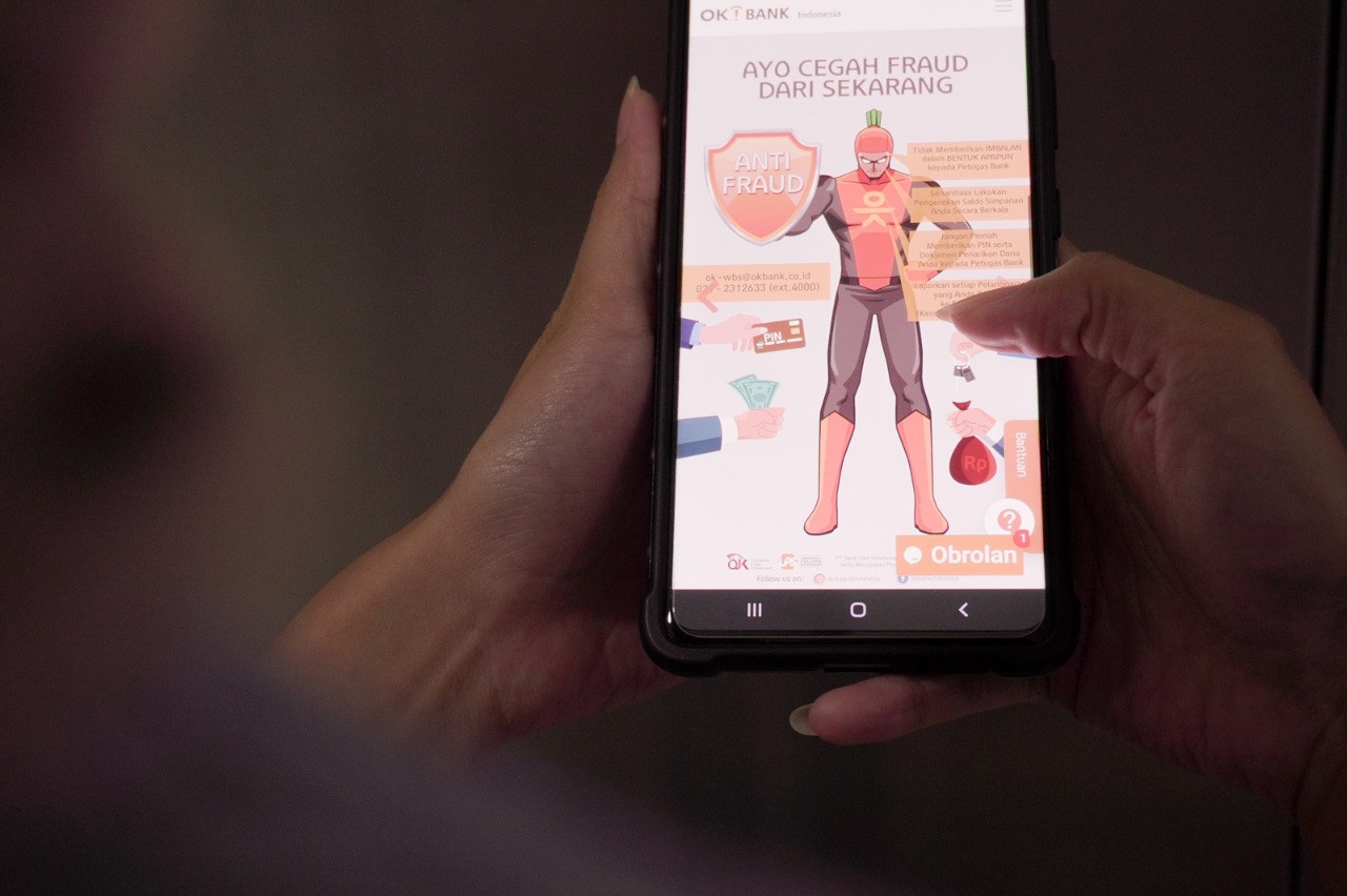 Aplikasi OK! Bank pada layar ponsel.