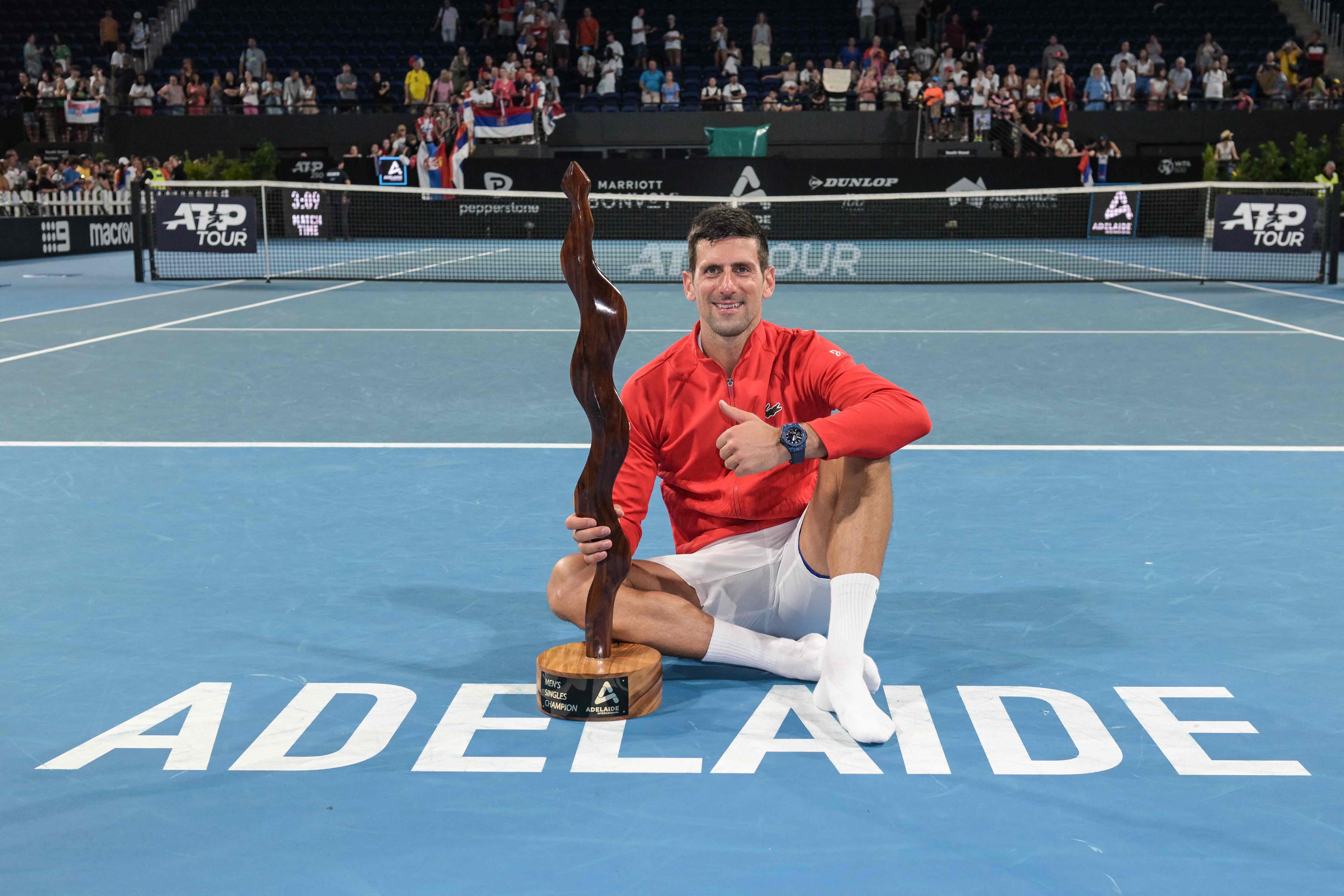 Petenis Serbia Novak Djokovic usai menjadi juara di Adeladei International.