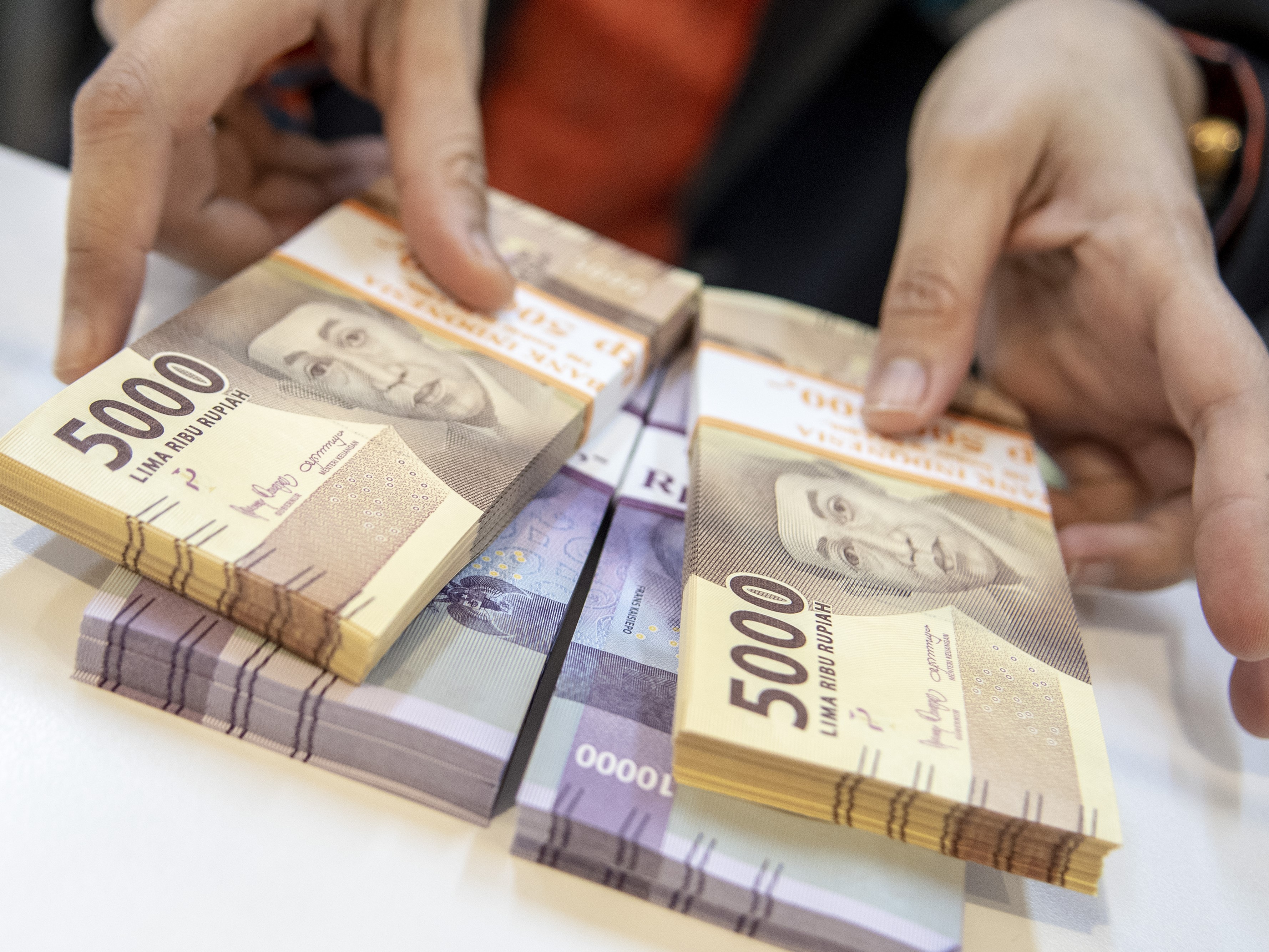 BI Naikkan Suku Bunga Acuan, Wajah Bankir Bahagia