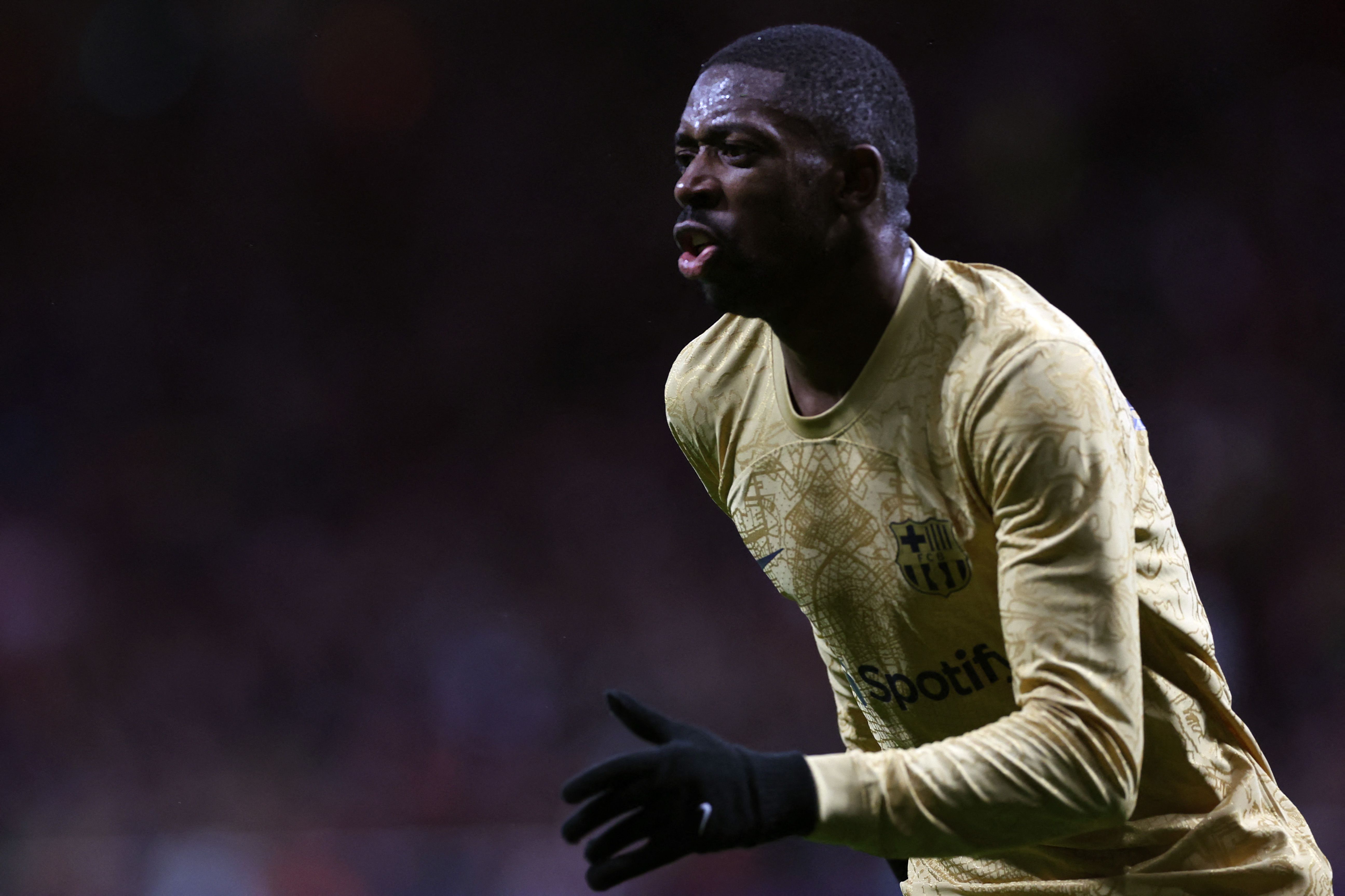 Penyerang Barcelona Ousmane Dembele melakukan selebrasi usai mencetak gol ke gawang Atletico Madrid di laga La Liga.