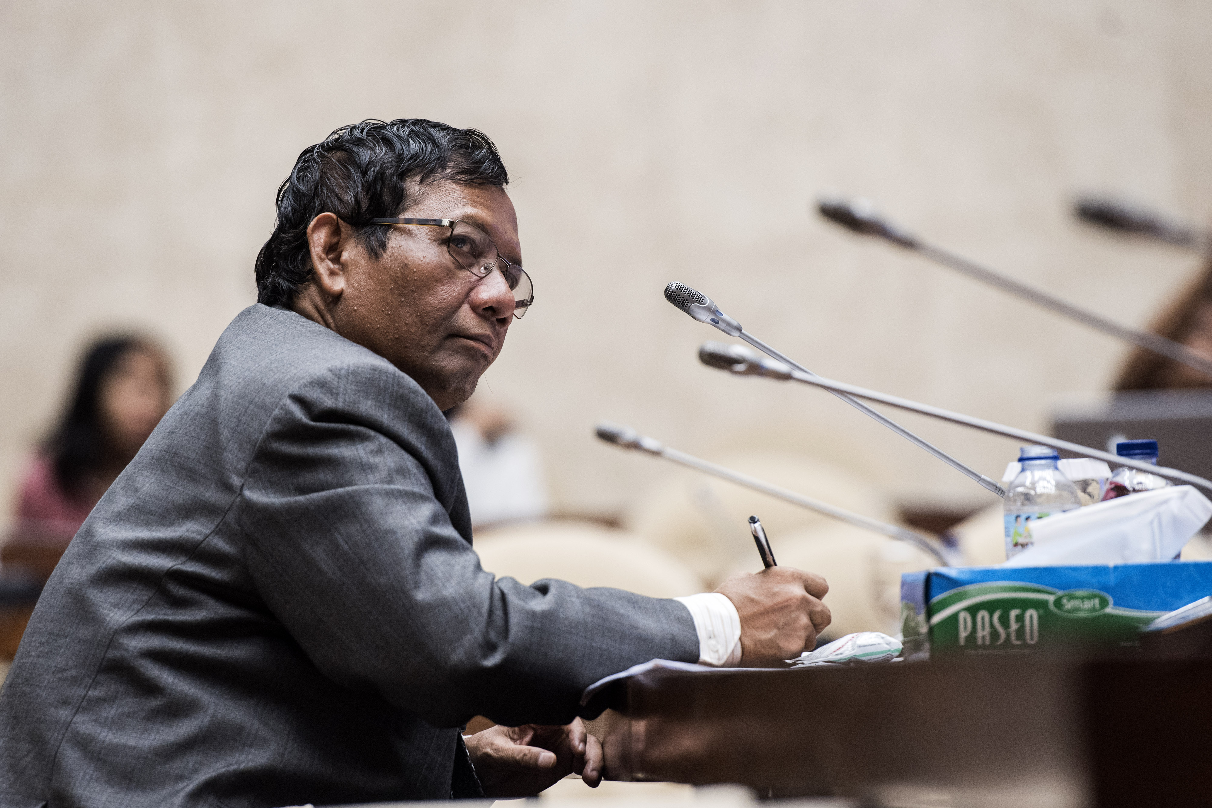 Menko Polhukam Mahfud MD saat menghadiri sebuah pertemuan.