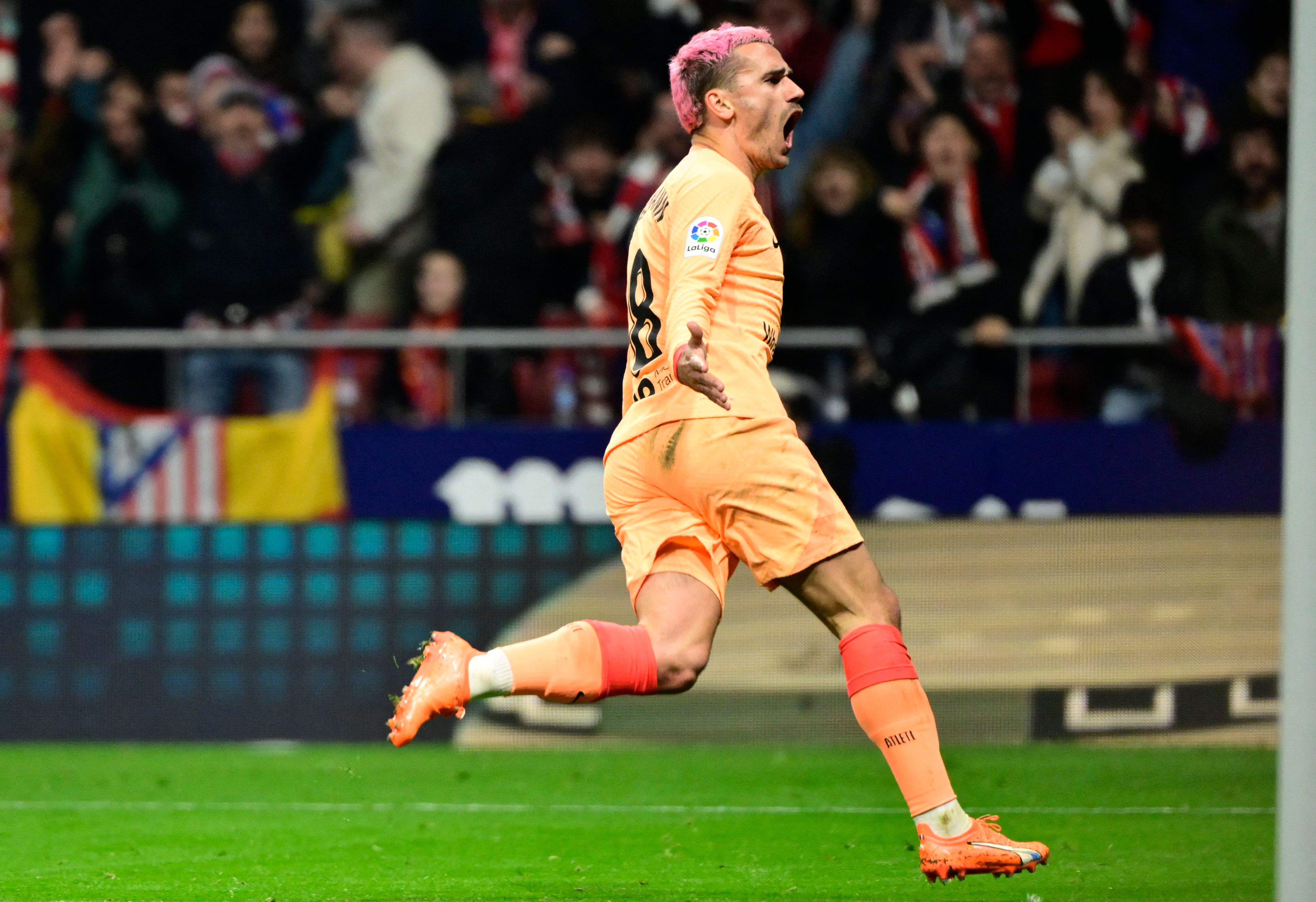 Penyerang Atletico Madrid Antoine Griezmann melakukan selebrasi usai mencetak gol ke gawang Athletic Bilbao di laga La Liga.