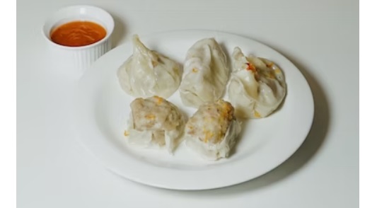 (Ilustrasi): Kuotie (deret atas) merupakan makanan khas Tiongkok.