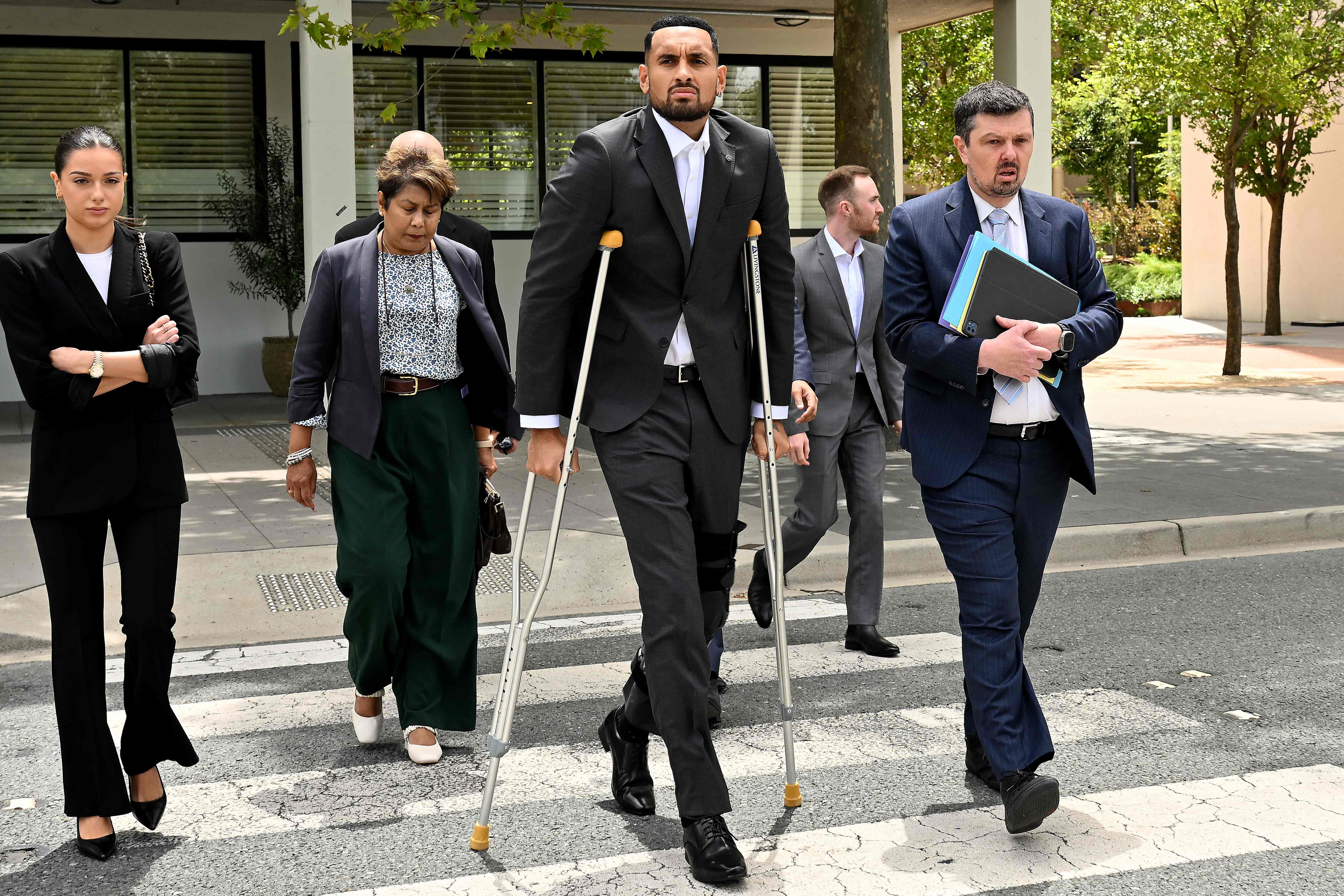 Petenis Australia Nick Kyrgios saat tiba di pengadilan Canberra, Australia.