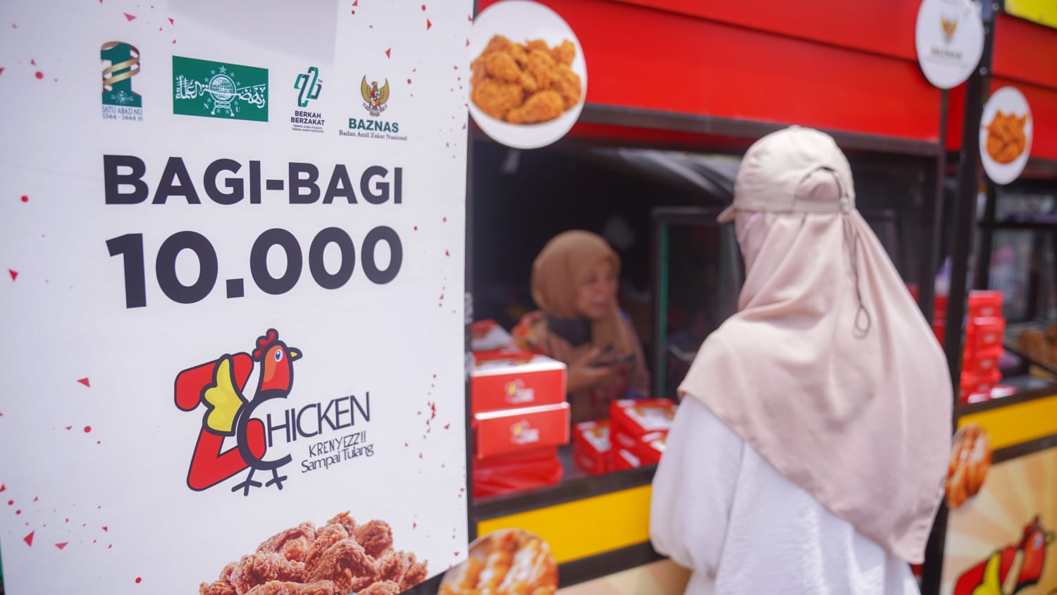 Baznas membagikan 10 ribu paket nasi ayam untuk peserta yang hadir di Harlah Seabad NU
