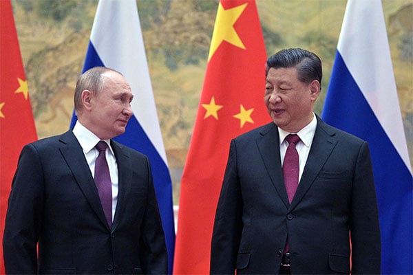 Pemimpin Tiongkok Xi Jinping (kanan) dan Presiden Rusia Vladimir Putin. 
