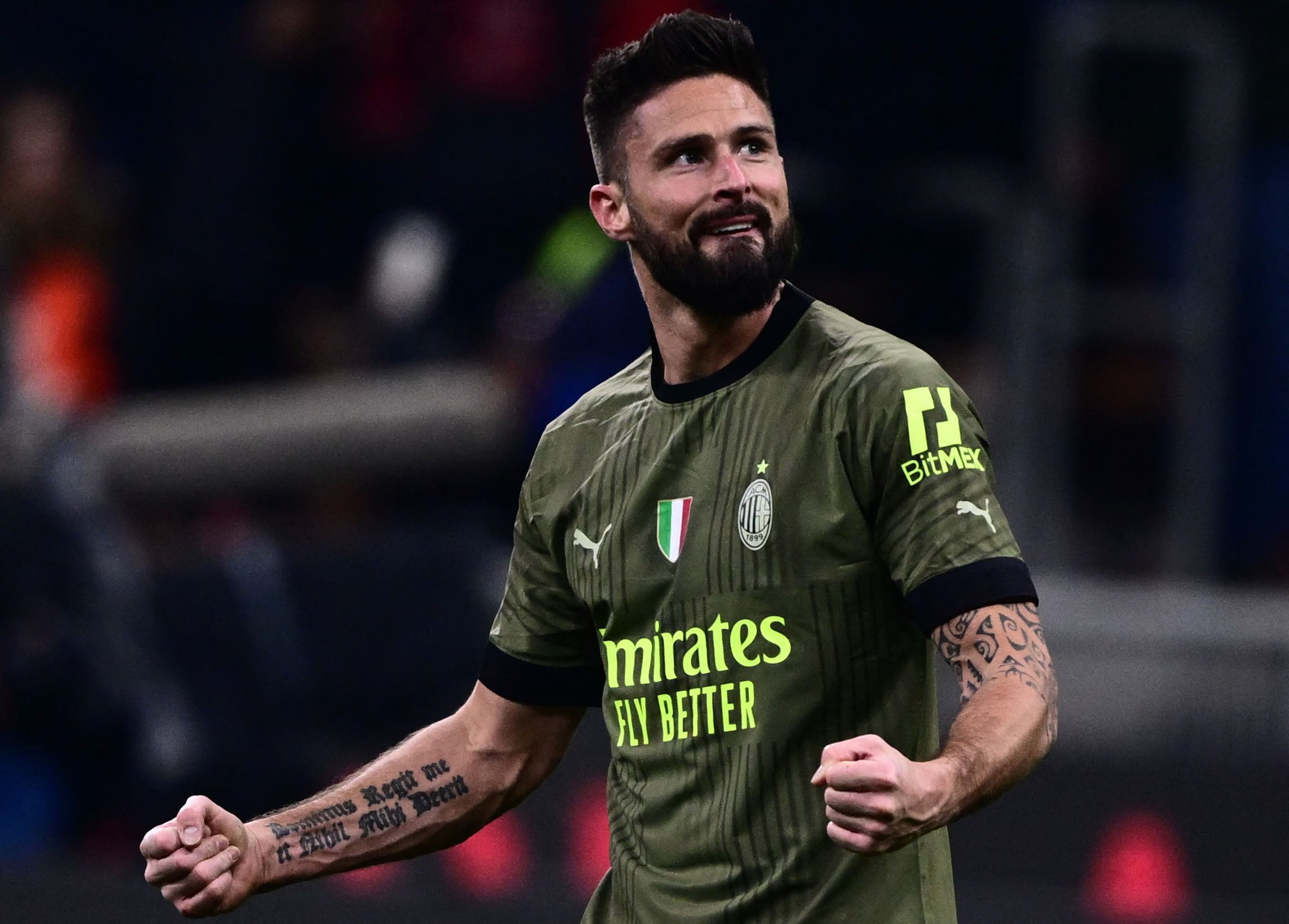 Penyerang AC Milan Olivier Giroud melakukan selebrasi usai mencetak gol ke gawang Torino di laga Serie A.