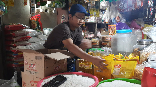 Ilustrasi: pedagang beras