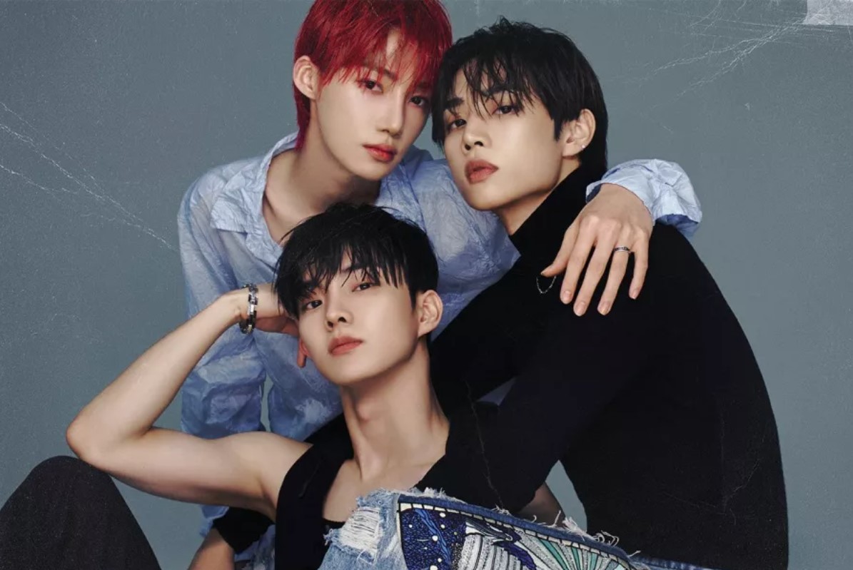 Tiga personel The Boyz Sunwoo, Q, dan New.