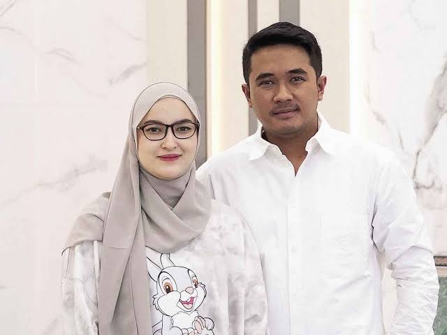 Aswin Yanuar dan istri Claudya Harida