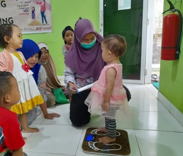 Ilustrasi pemantauan gizi anak