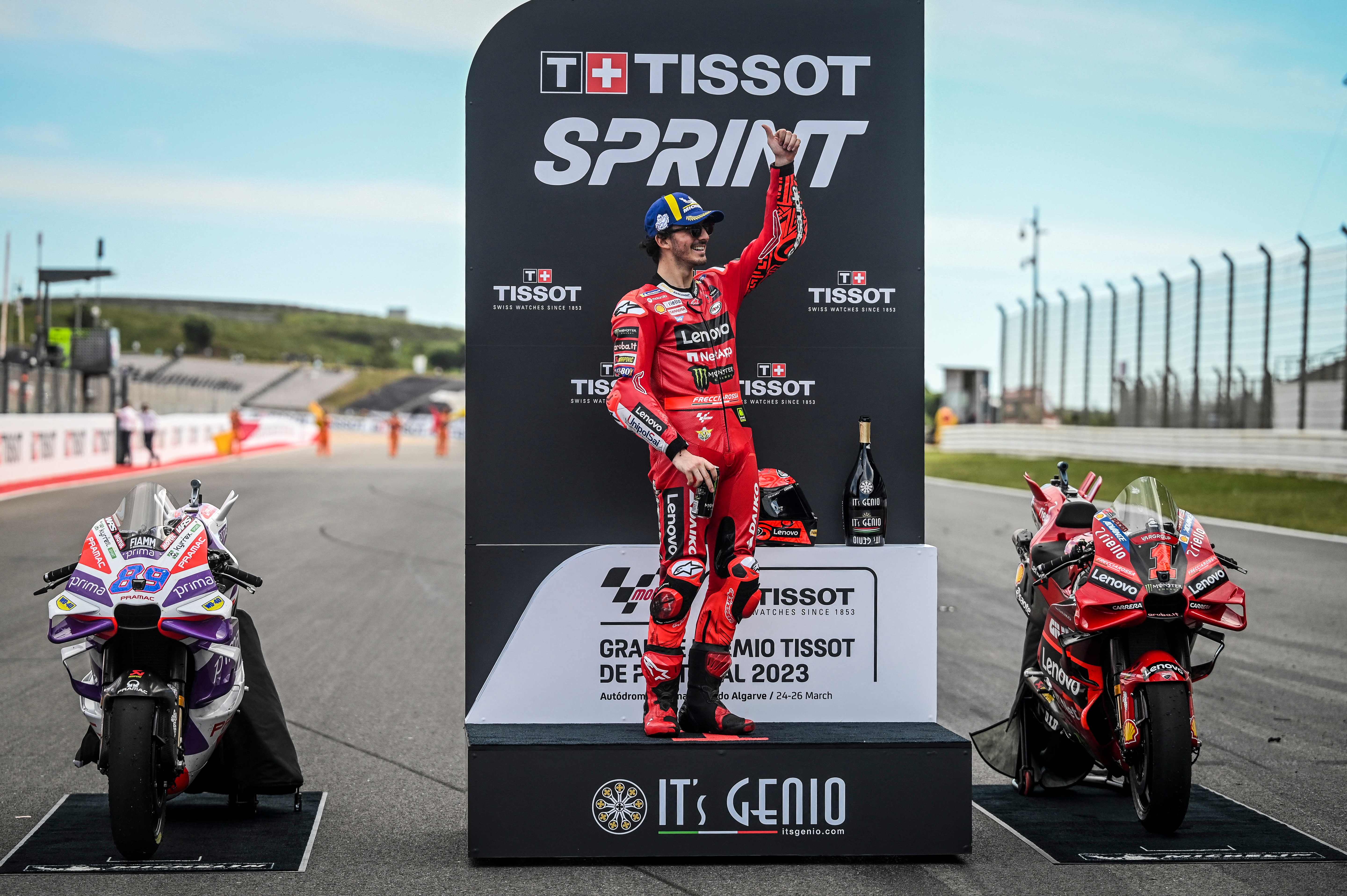 Pembalap Ducati Lenovo Francesco Bagnaia berada di podium usai menang di sprint race GP Portugal.