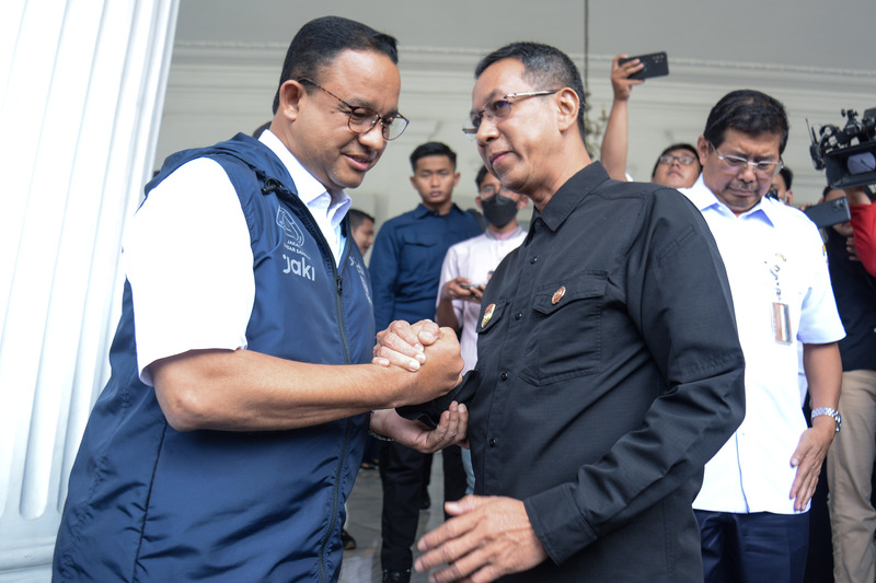 PJ Gubernur DKI Jakarta Heru Budi Hartono dan Anies Baswedan