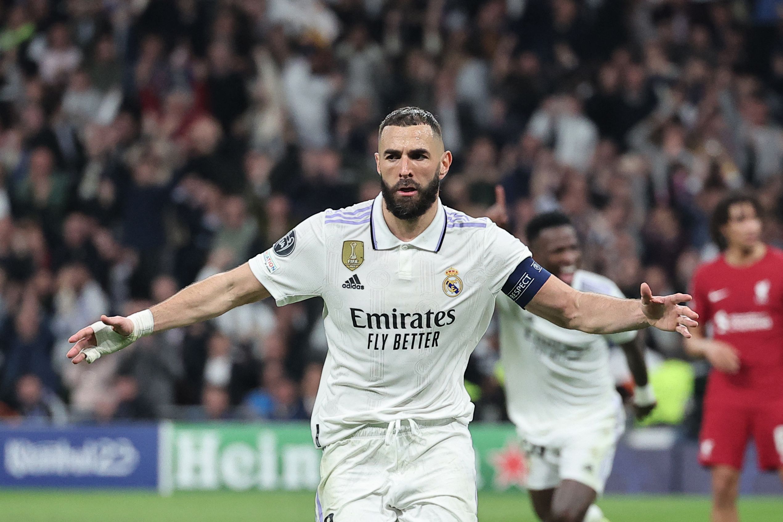 Penyerang Real Madrid Karim Benzema melakukan selebrasi usai mencetak gol ke gawang Liverpool di laga Liga Champions.