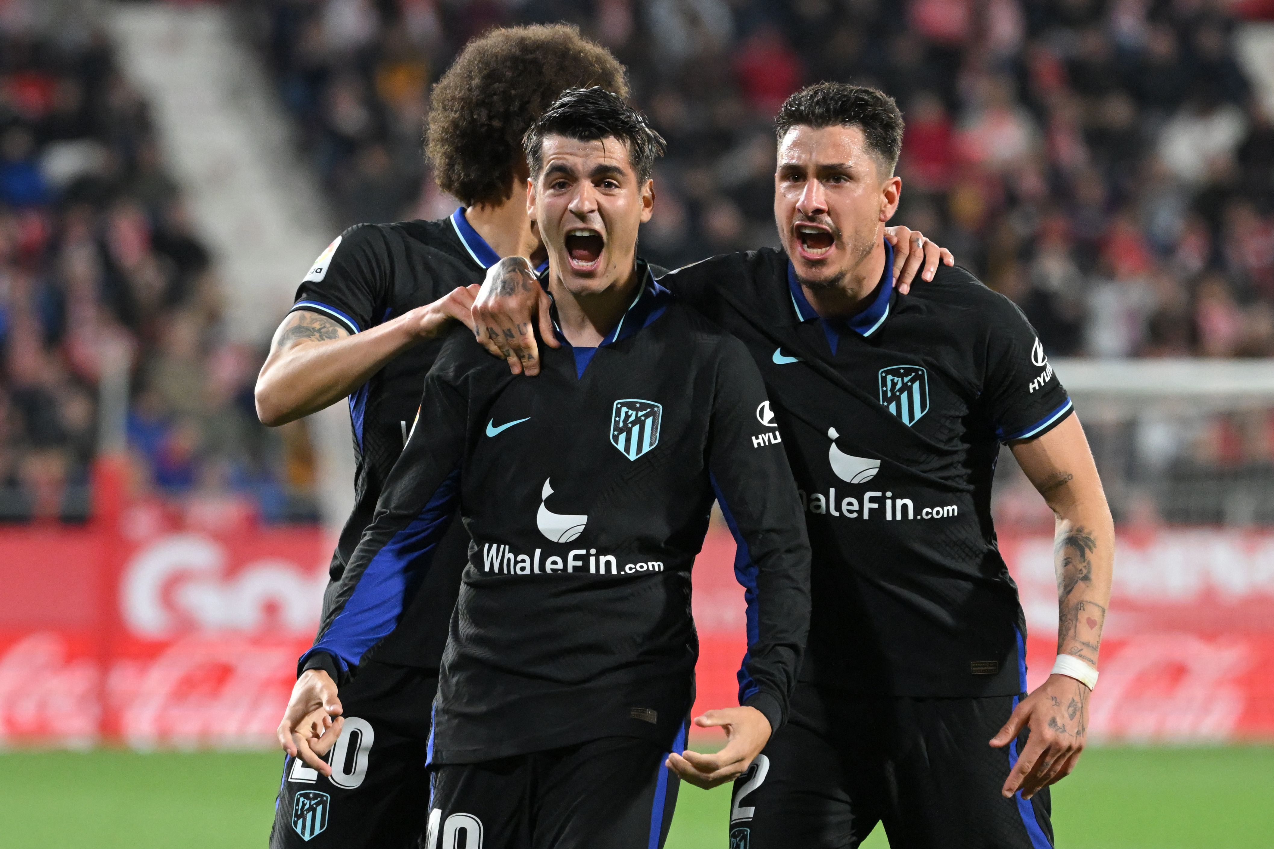 Penyerang Atletico Madrid Alvaro Morata (tengah) melakukan selebrasi usai mencetak gol ke gawang Girona di laga La Liga.