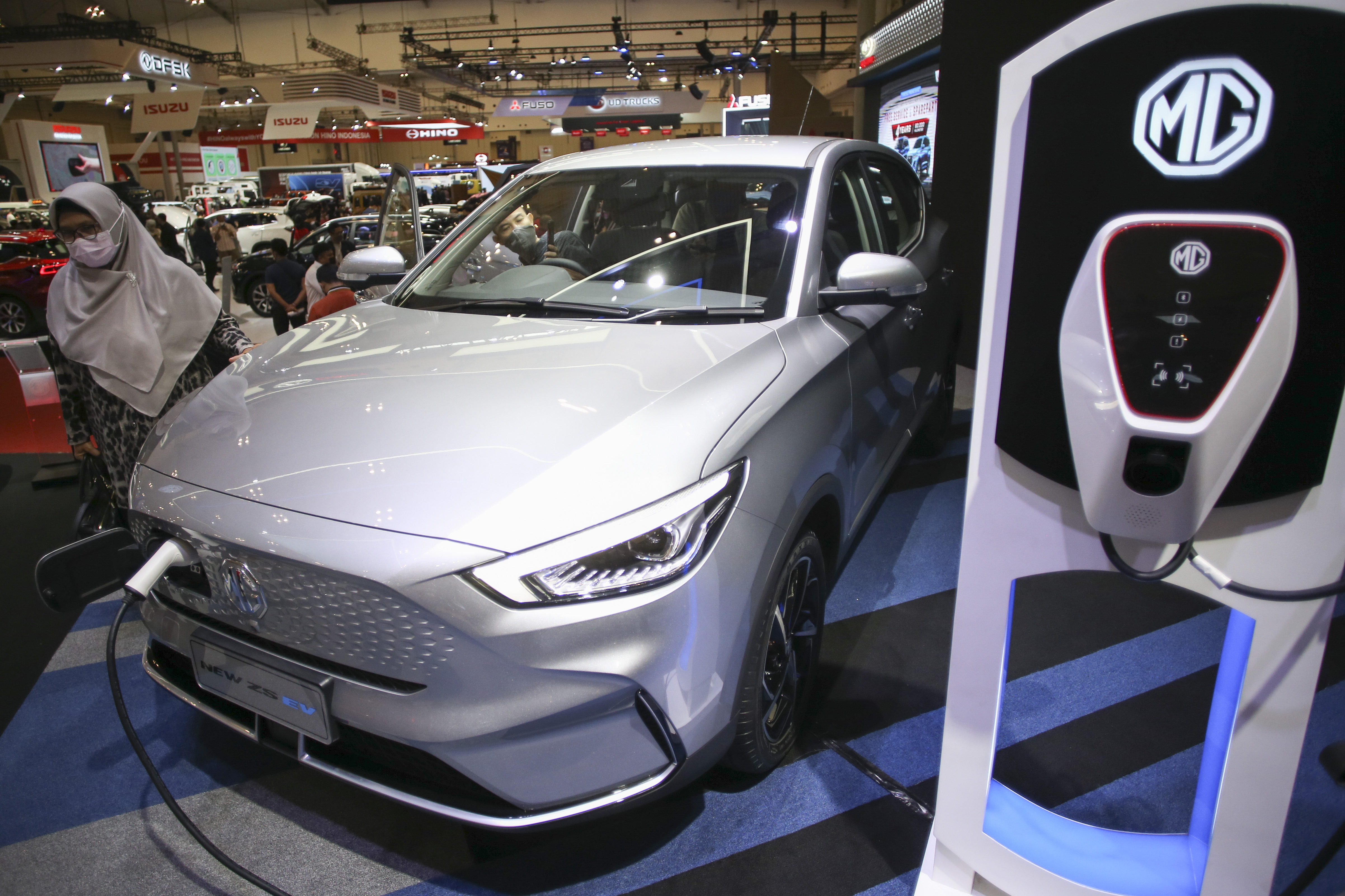 Ilustrasi mobil listrik.