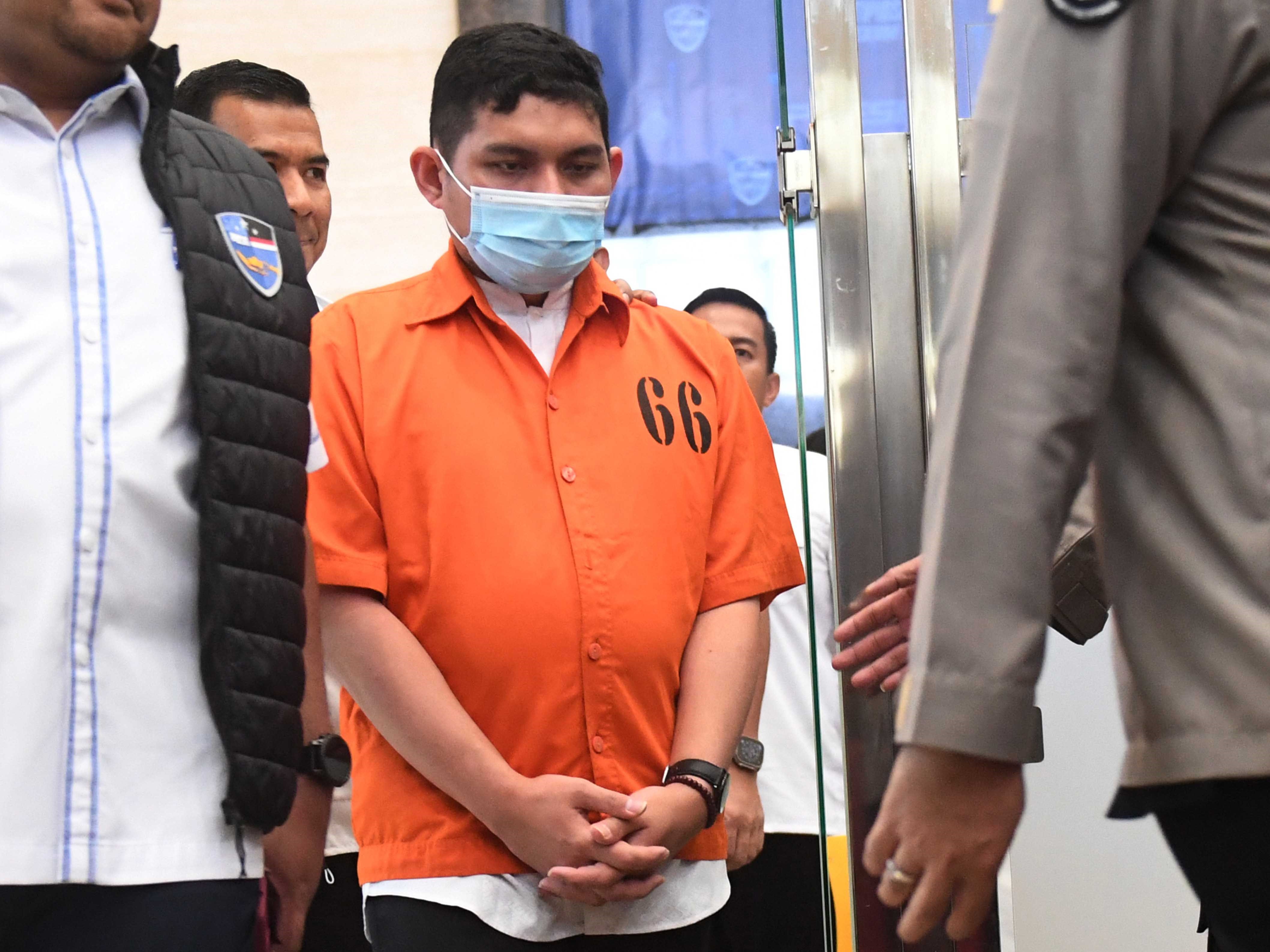 Tersangka kasus dugaan ujaran kebencian yang merupakan peneliti Badan Riset dan Inovasi Nasional (BRIN) Andi Pangerang Hasanuddin.