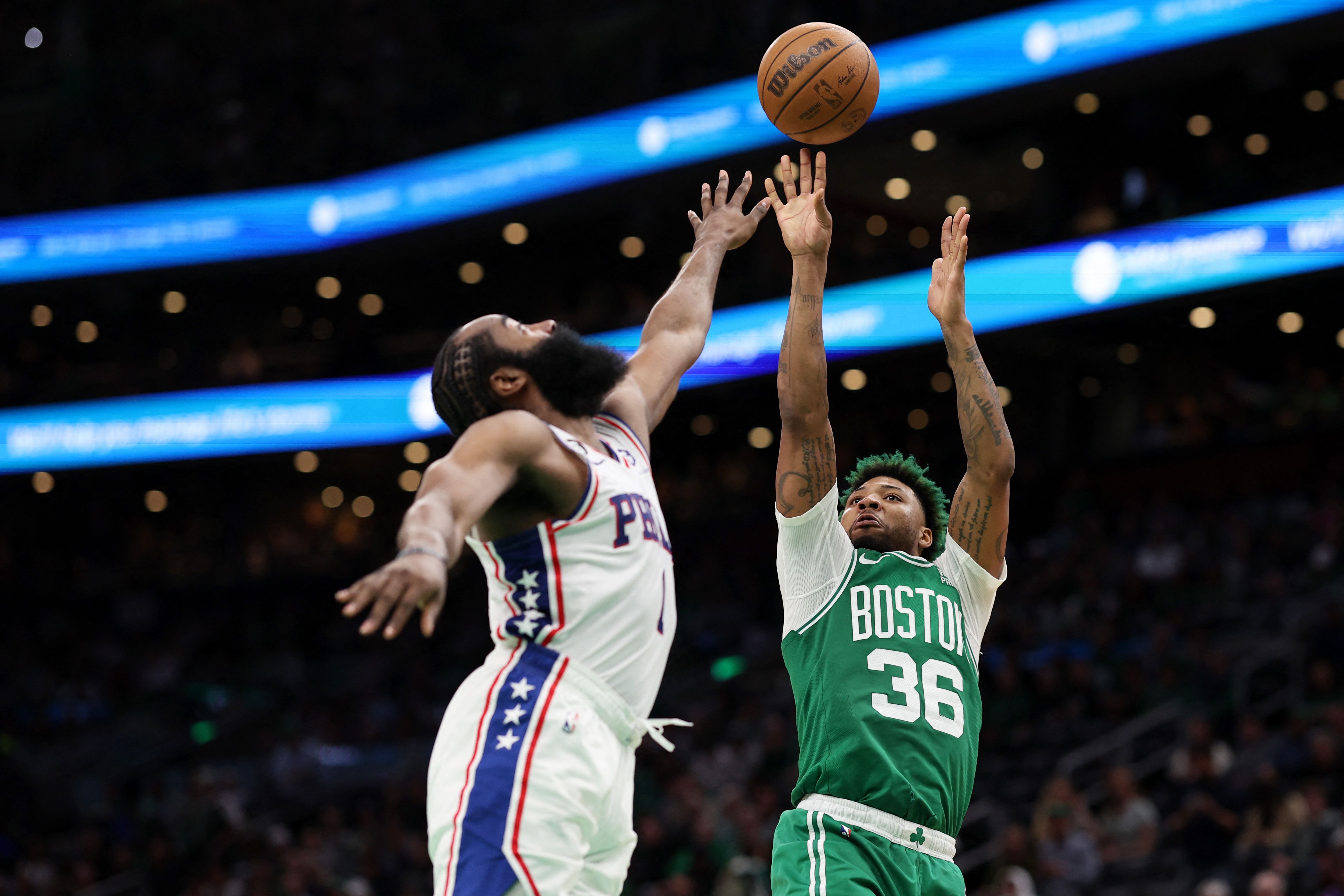Pebasket Boston Celtics Marcus Smart melepaskan tembakan dalam laga playoff NBA melawan Philadelphia 76ers.