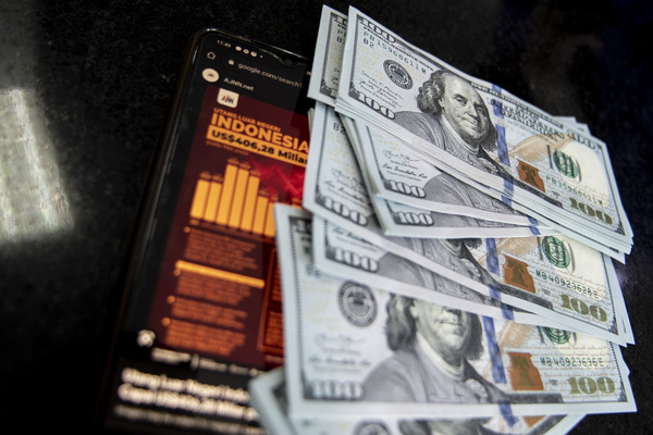 Tumpukan uang Dollar AS.