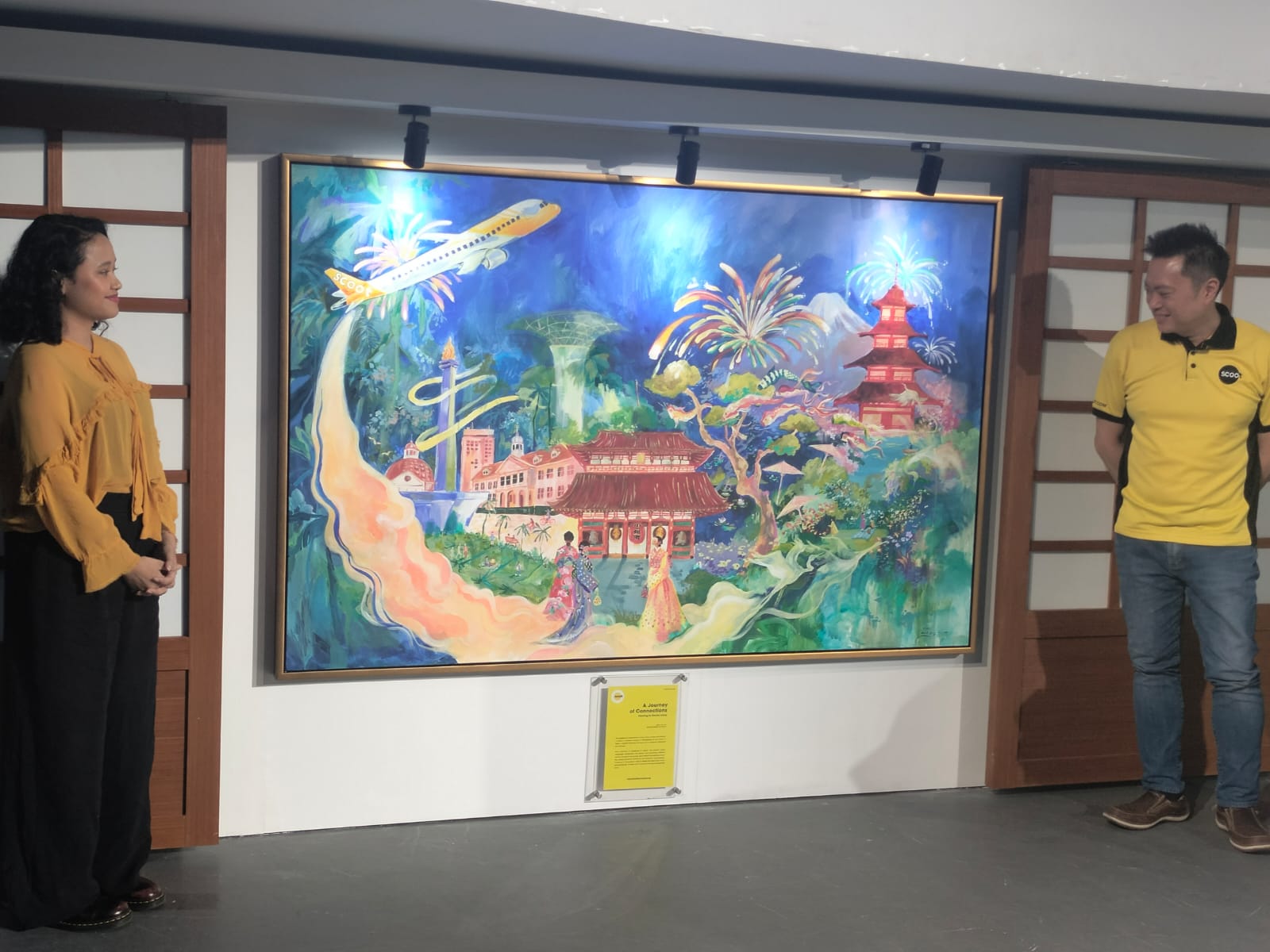 Pelukis Muda Rachel Ajeng Digandeng Maskapai Scoot Hasilkan Lukisan Traveling