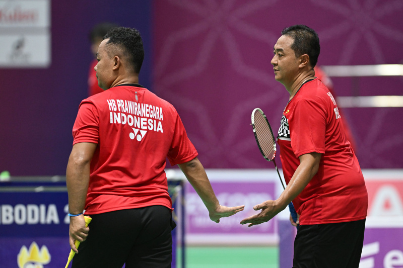 Dua ganda Indonesia beraksi dalam final melawan Malaysia di APG Kamboja.