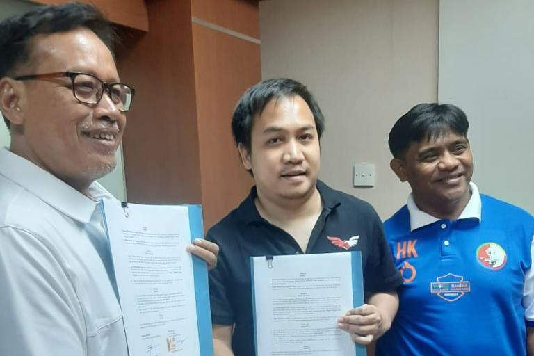 Penandatanganan kerja sama Liga Antar Kampung.