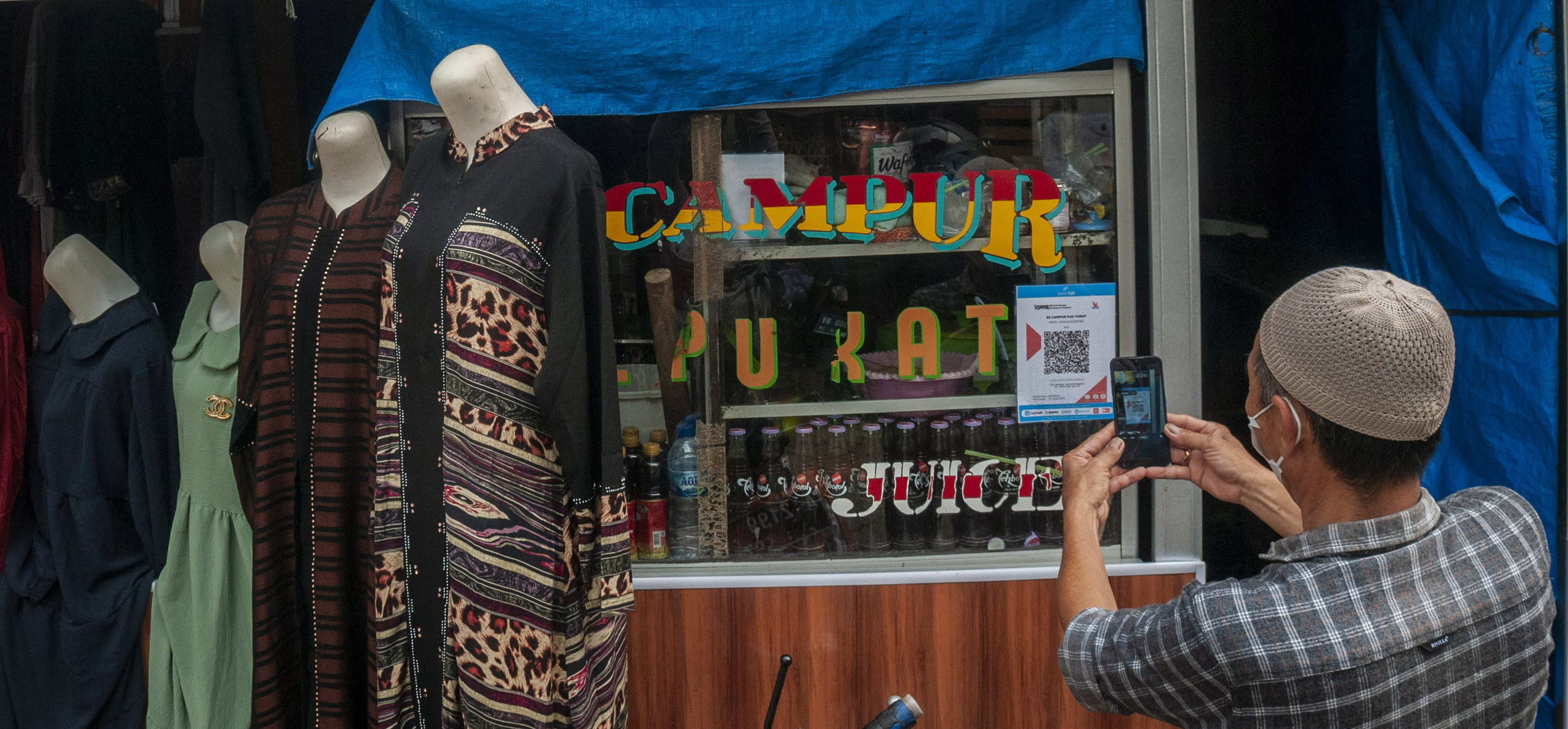 Foto ilustrasi: Bank Indonesia (BI) mencatat, sebagian pesar merchant pemanfaat QRIS adalah UMKM. 